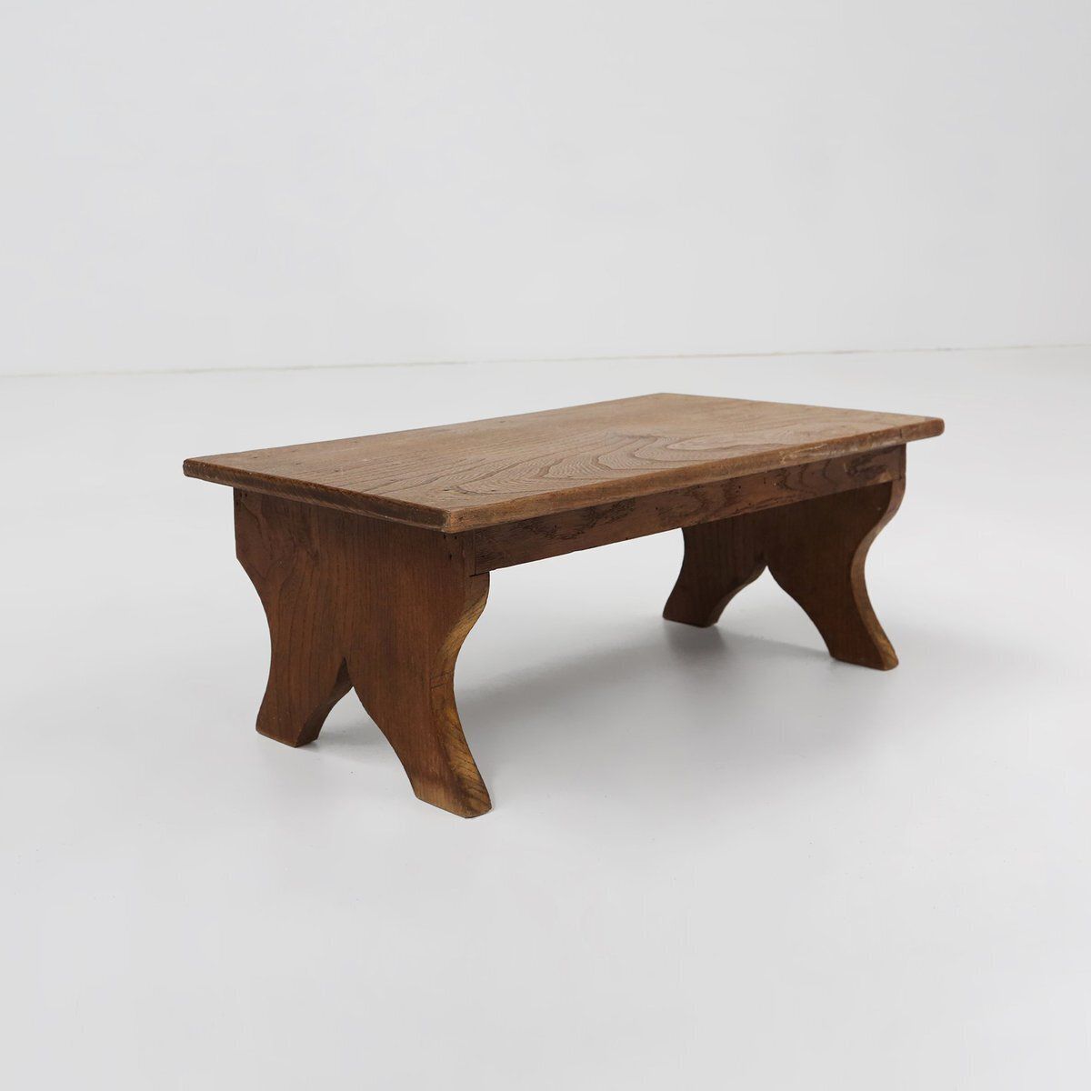 Small Rustic Wooden Stool With Curved Base, France, 1900s photo for sale