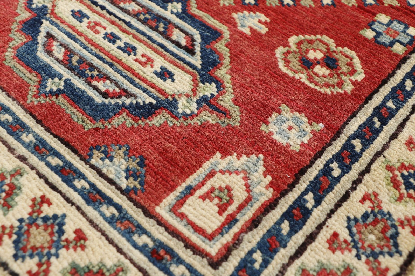 Small Red And Ivory Kazak Afghan Traditional Rug photo Textiles