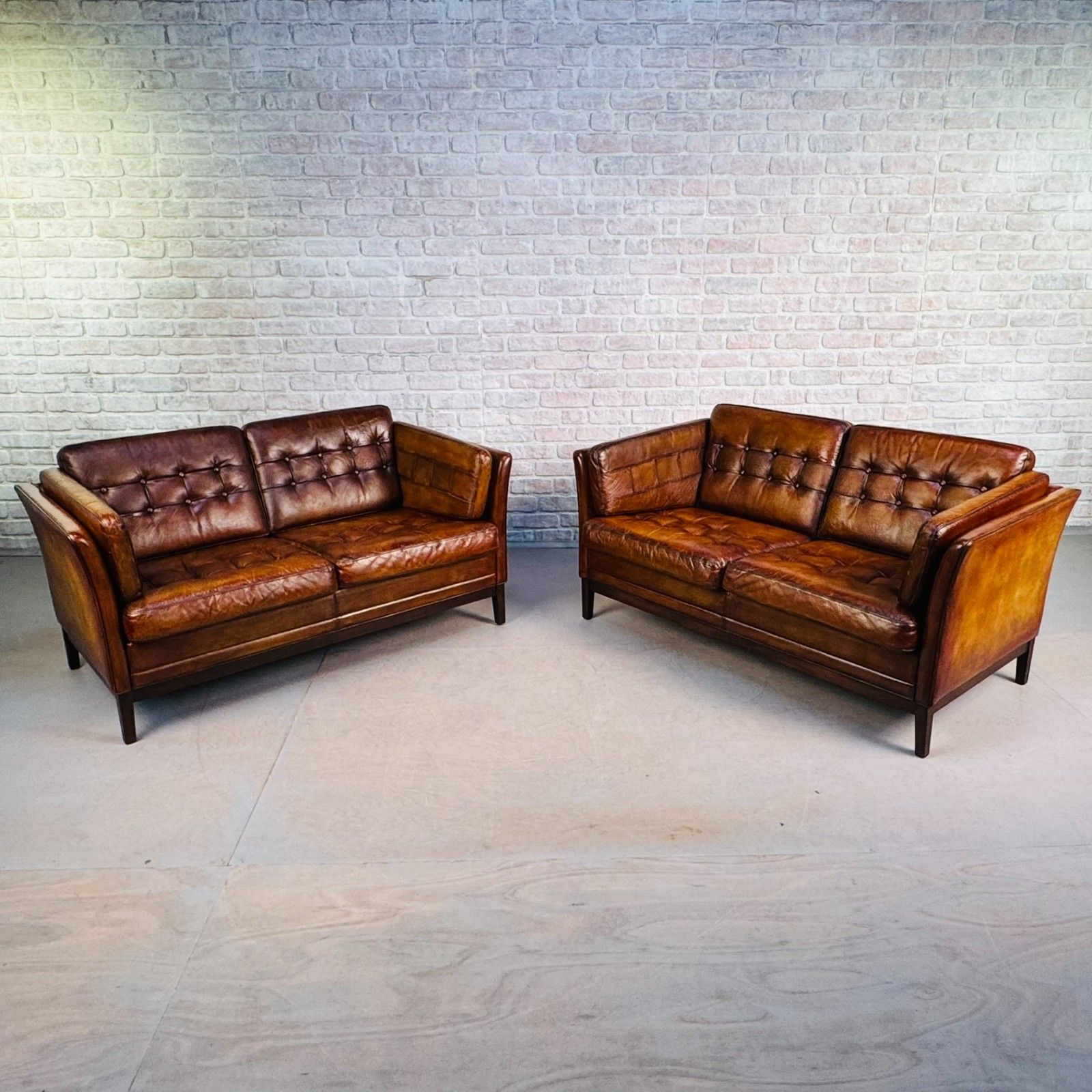 Pair Of Vintage Danish Tan Leather Two Seater Sofas