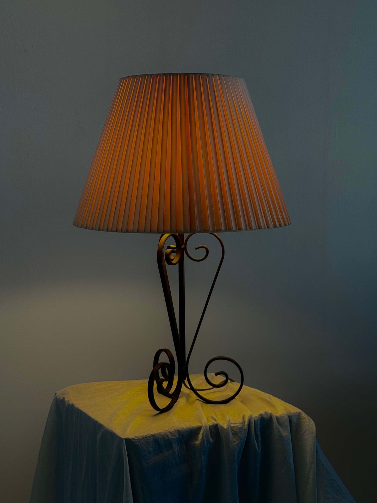 Vintage Wrought Iron Table Lamp In A Swirl Shape With A Pleated Shade