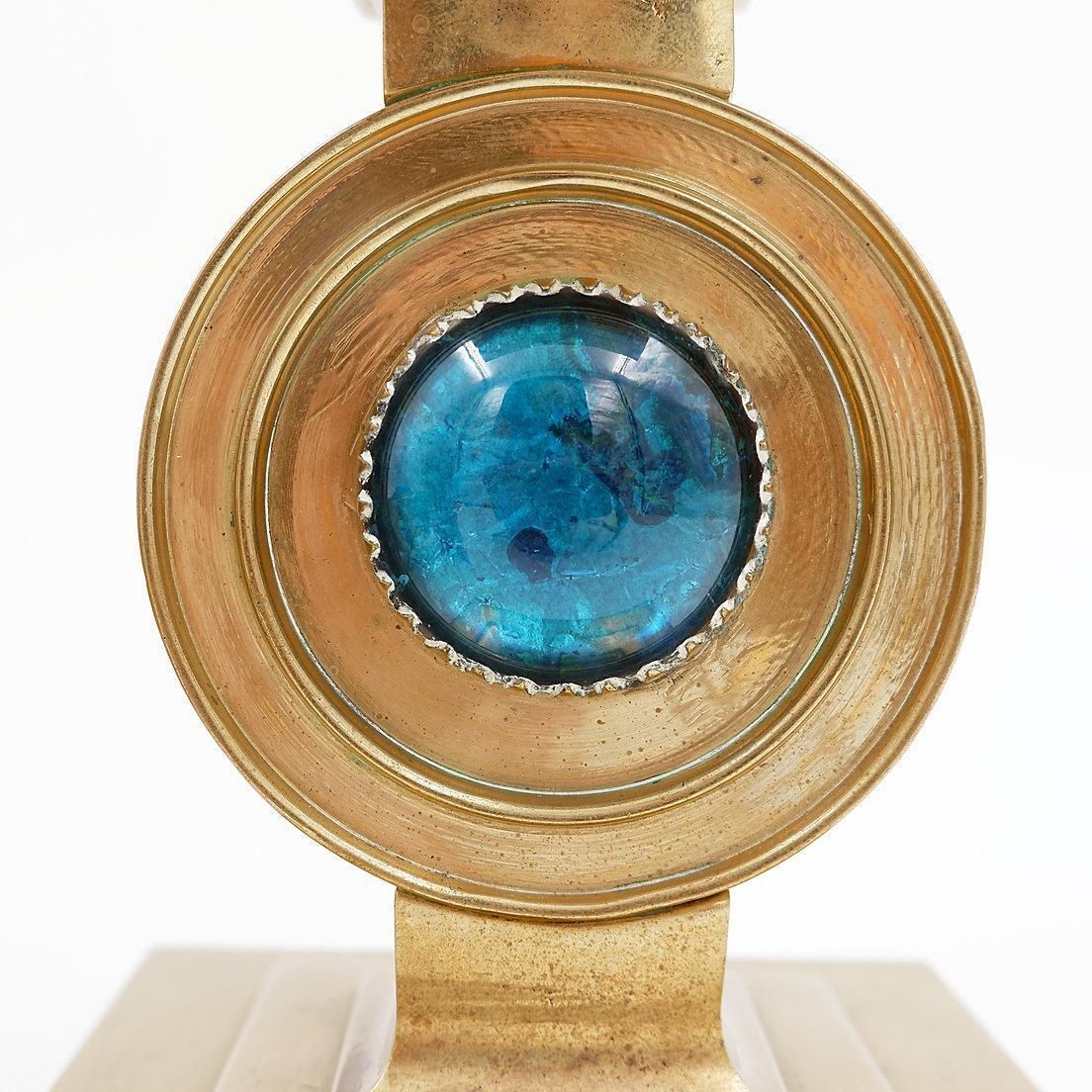 Pair Of Brass Candlesticks Decorated With A Blue Stone Inlaid In The Center photo vintage