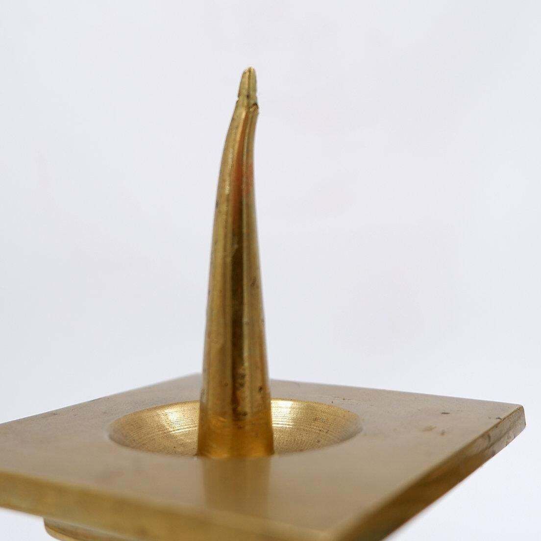 966.0 Pair Of Brass Candlesticks Decorated With A Blue Stone Inlaid In The Center photo