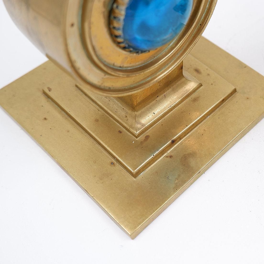 photo vinterior Pair Of Brass Candlesticks Decorated With A Blue Stone Inlaid In The Center
