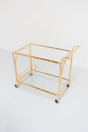 Hollywood Regency stijl barcart met touwdetails photo vinterior