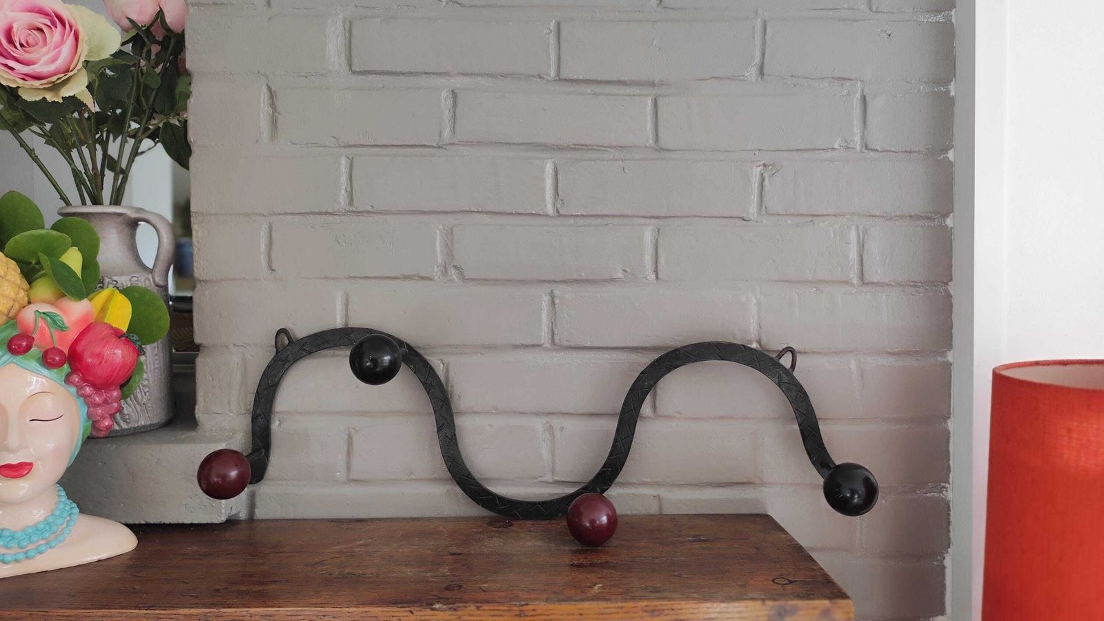 photo for sale 1960s French Iron Wall Coat Rack With Wood Ball Hooks