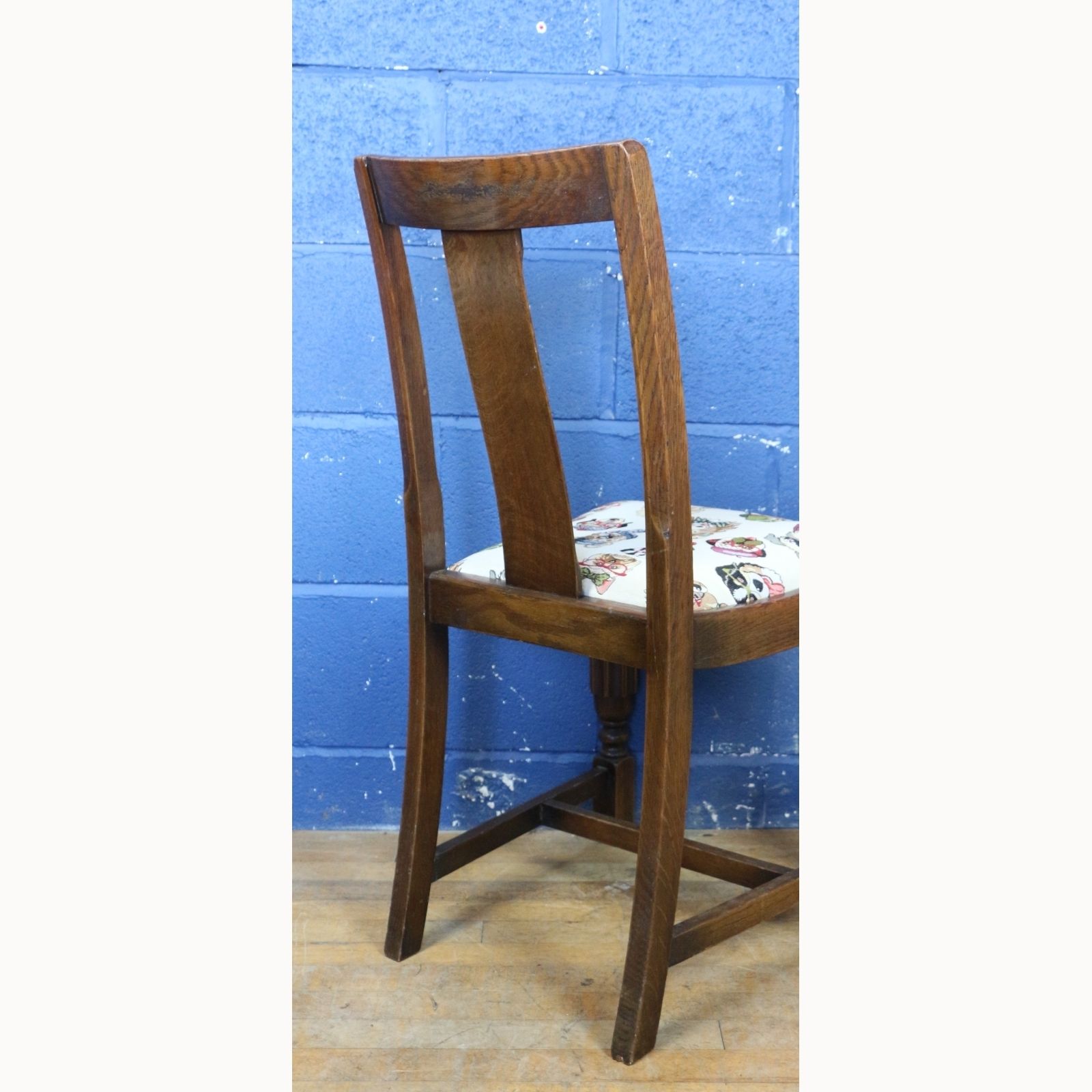 A Set Of Four 1950s Carved Oak Dining Chairs Freshly Reupholstered With Stylised Dog Faces photo vinterior