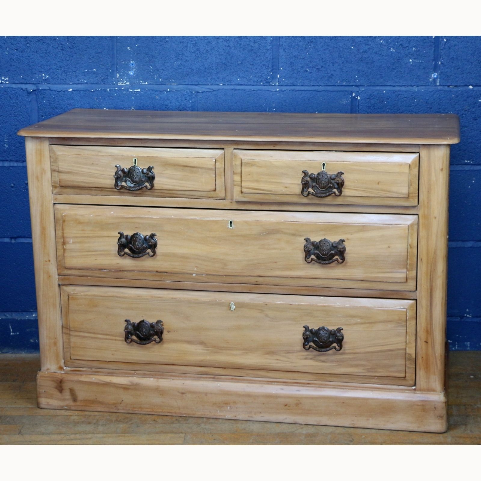 A Victorian Light Walnut Two Over Two Chest Of Drawers