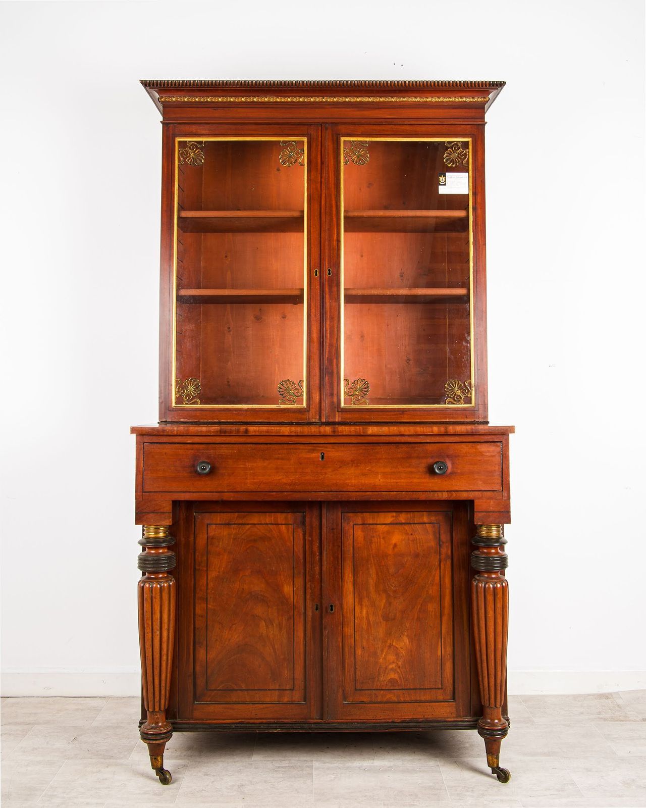 Regency Mahogany Glazed Bookcase With Brass Anthemion Mounts & Ebonised Columns, C.1815