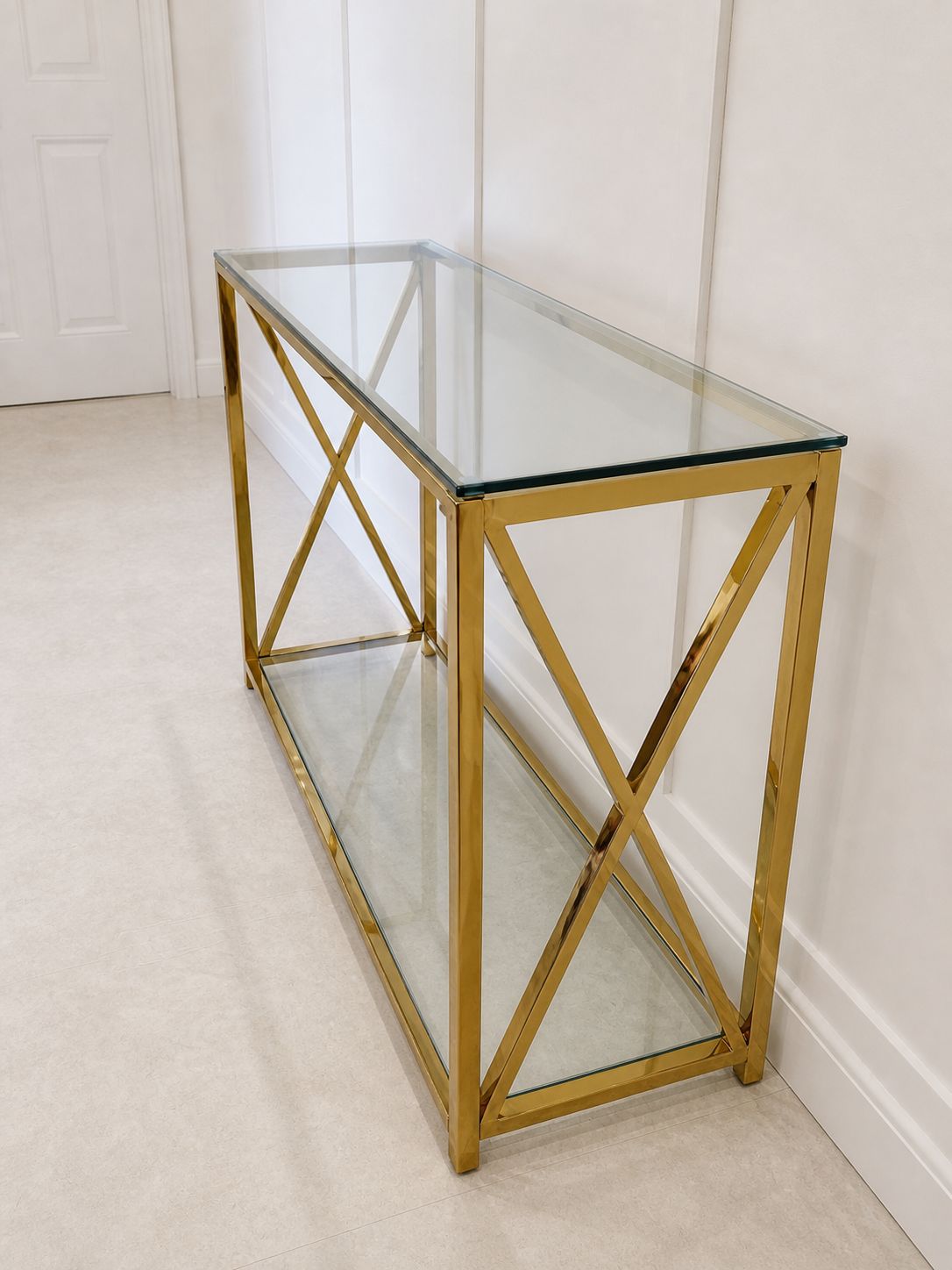 Two Tier Brass & Glass Table, Cross Braced X Frame — 120×40×76 Cm photo for sale