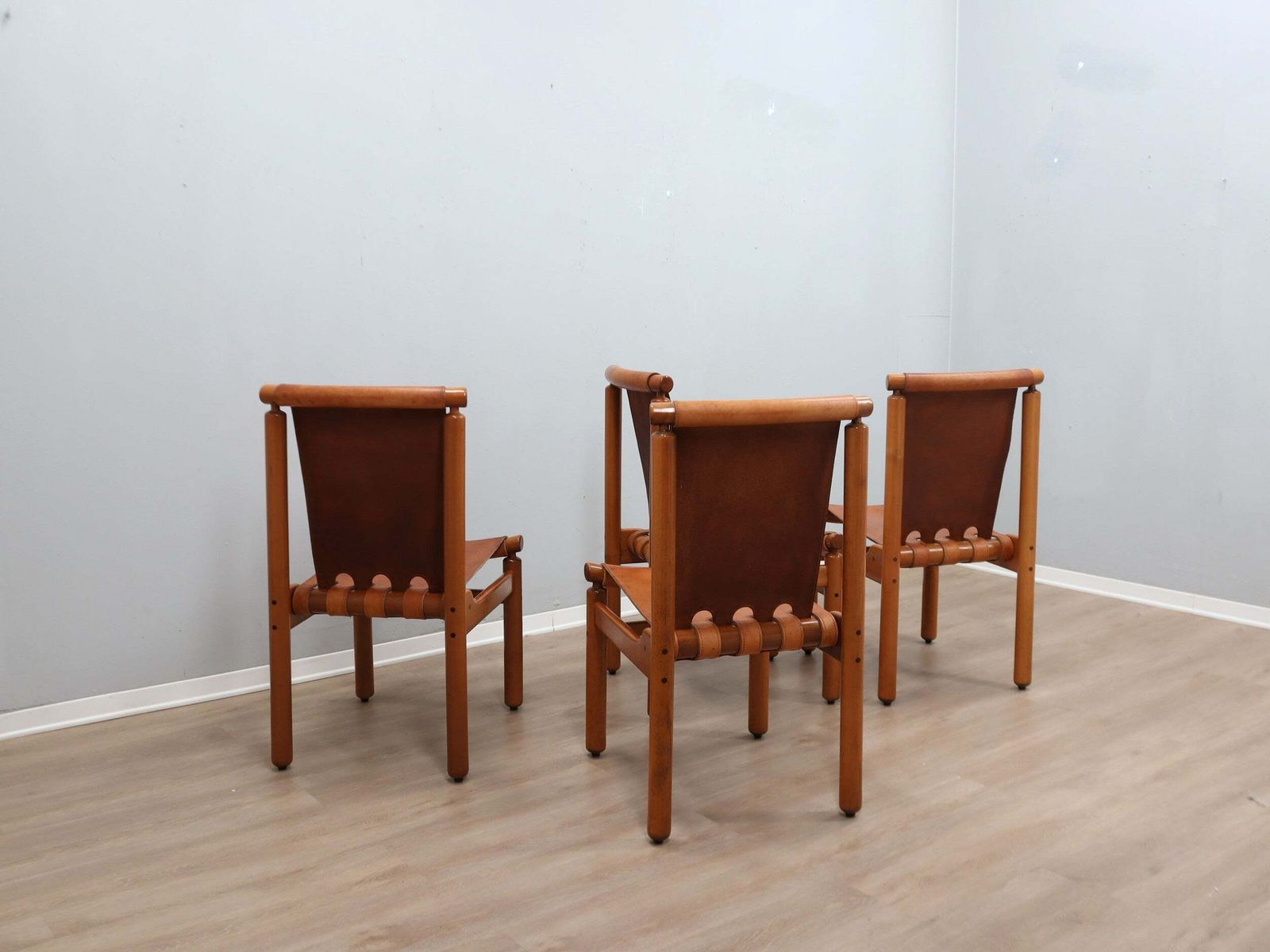 2800.0 Set Of 4 Ilmari Tapiovaara For La Permanente Walnut And Leather Chairs 1960s photo