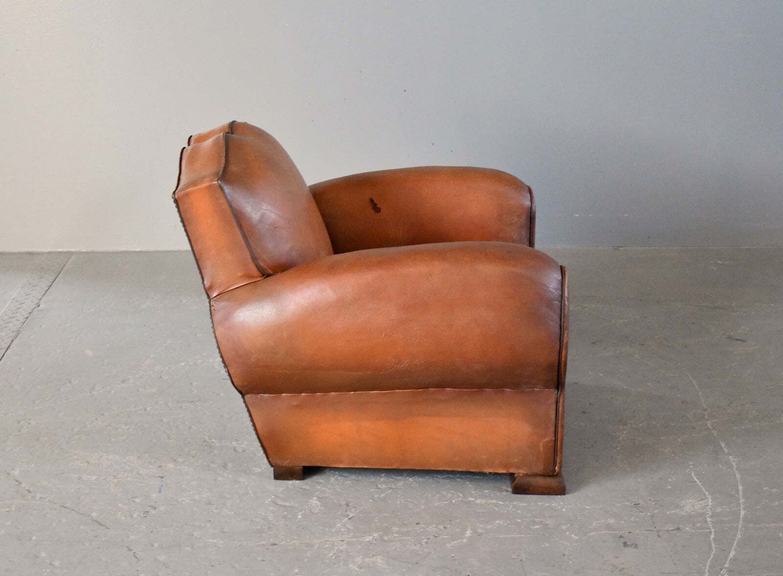 photo for sale French Moustache Backed Art Deco Leather Armchair Circa 1920s