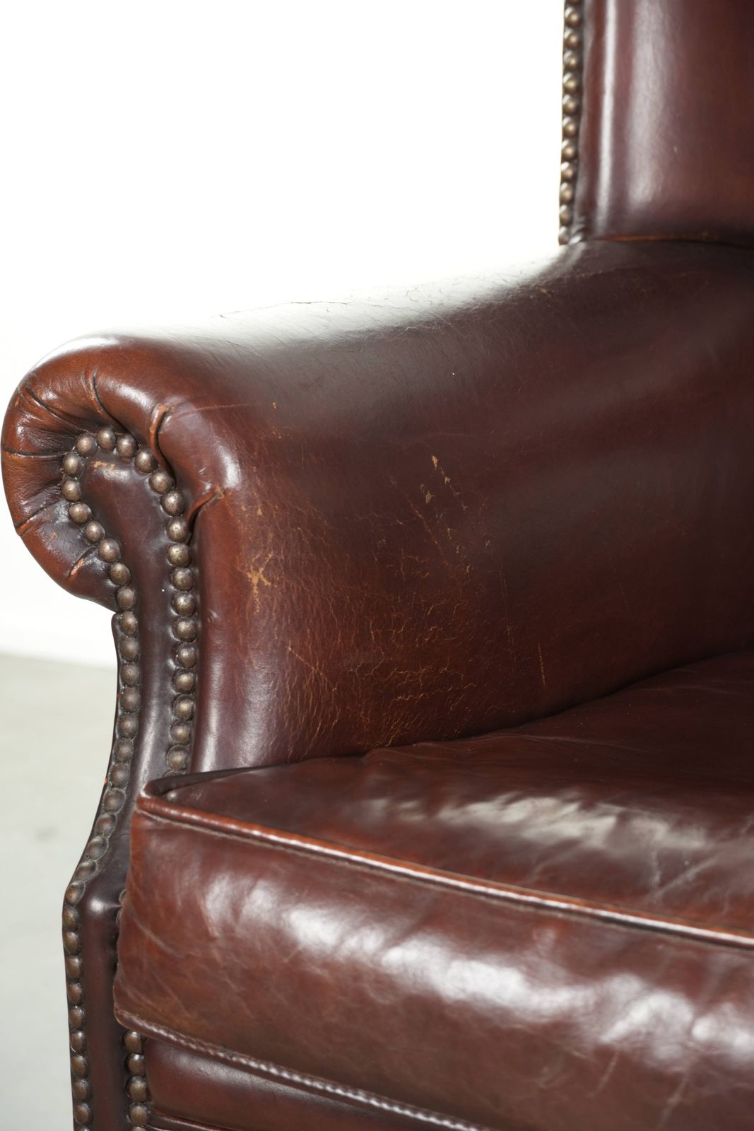 photo for sale Lovely Vintage Sheepskin Armchair With A High Back In A Beautiful, Subtle Size, Finished With Decorative Nails.