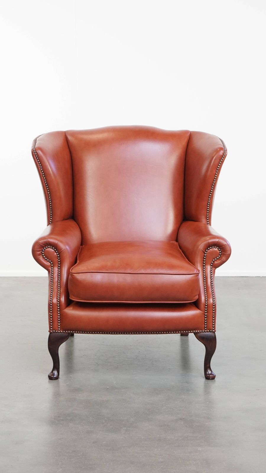 Elegant And Comfortable Smooth English Cowhide Chesterfield Wing Armchair With Graceful Legs photo furniture