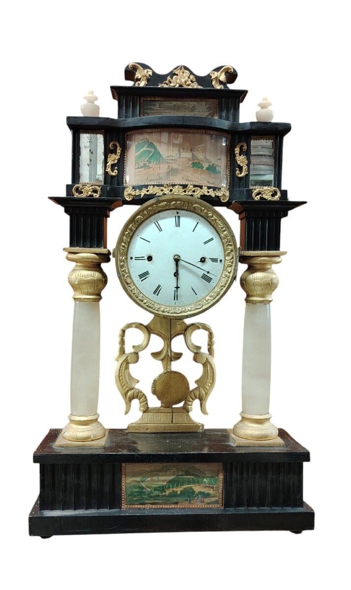 Biedermeier Mantel Clock In Ebonized And Gilded Wood, With Alabaster Columns, 19th Century