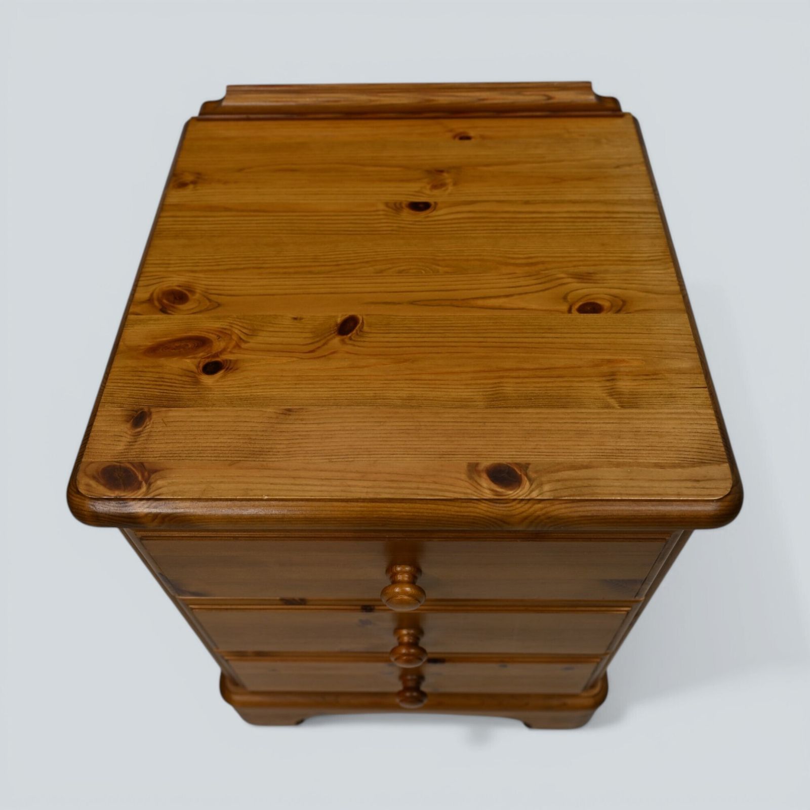 photo for sale Ducal Bedside Chest Of Drawers Knotted Pine On Castors Free Uk Delivery