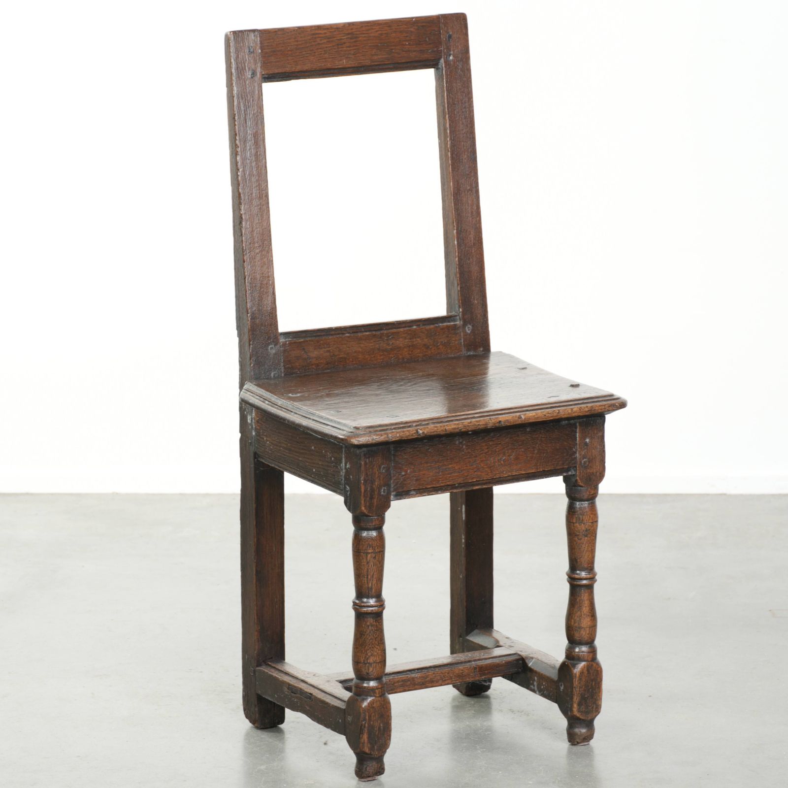 Beautiful And Subtle French Antique Lorraine Chair From The 18th Century Made Of Oak With Beautiful Deep Colors