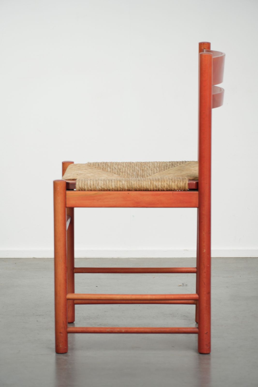Cute Red Vintage Wooden Chair From The 70’s With A Braided Wicker Seat photo 141.0