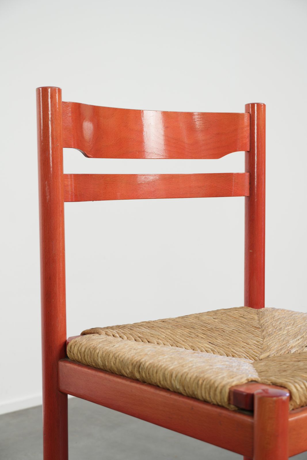 photo for sale Cute Red Vintage Wooden Chair From The 70’s With A Braided Wicker Seat