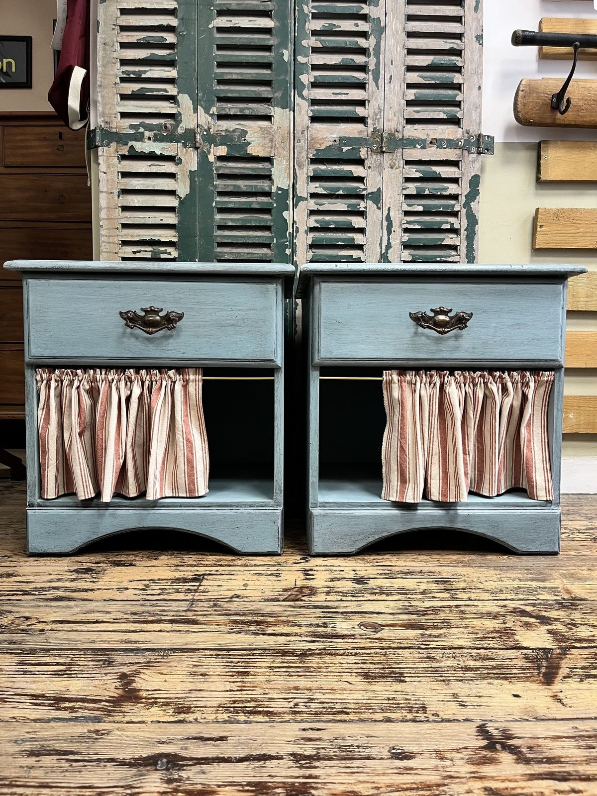 Pair Of Blue Bedside Tables With Striped Cafe Curtains photo furniture
