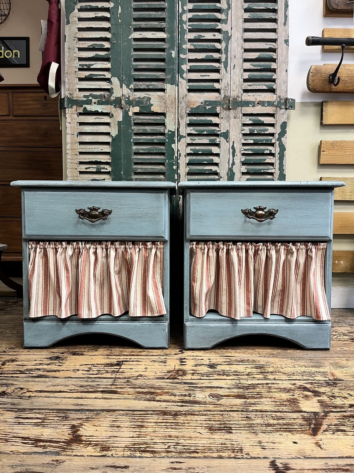 Pair Of Blue Bedside Tables With Striped Cafe Curtains
