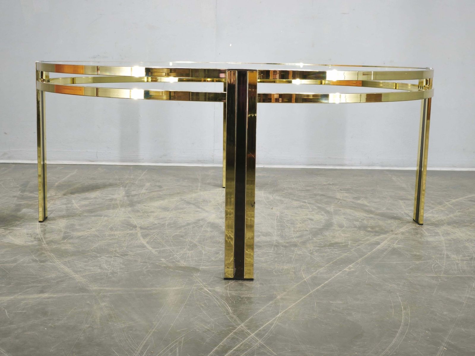 photo for sale Italian Brass And Glass Round Coffee Table, 1970s