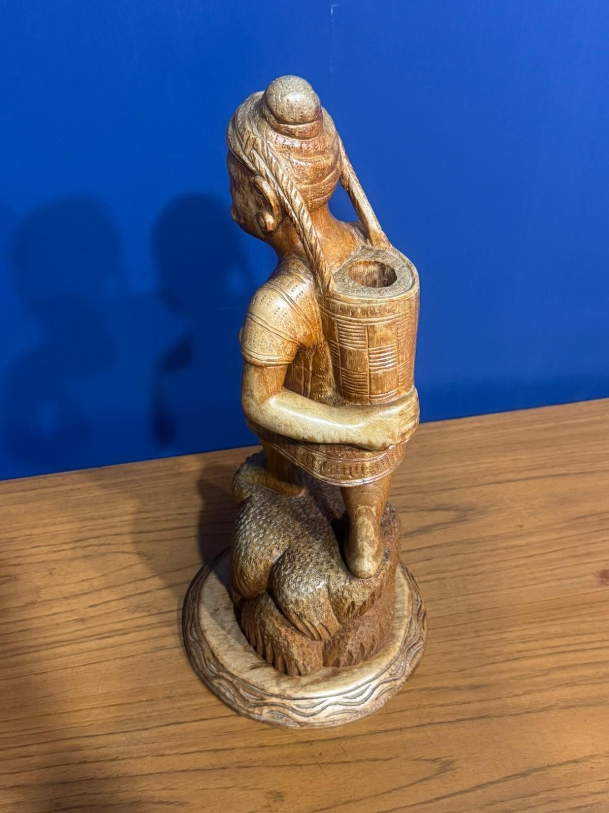 photo furniture Vintage Wood Carved Indonesian Figure Carrying A Basket Sculpture Statue