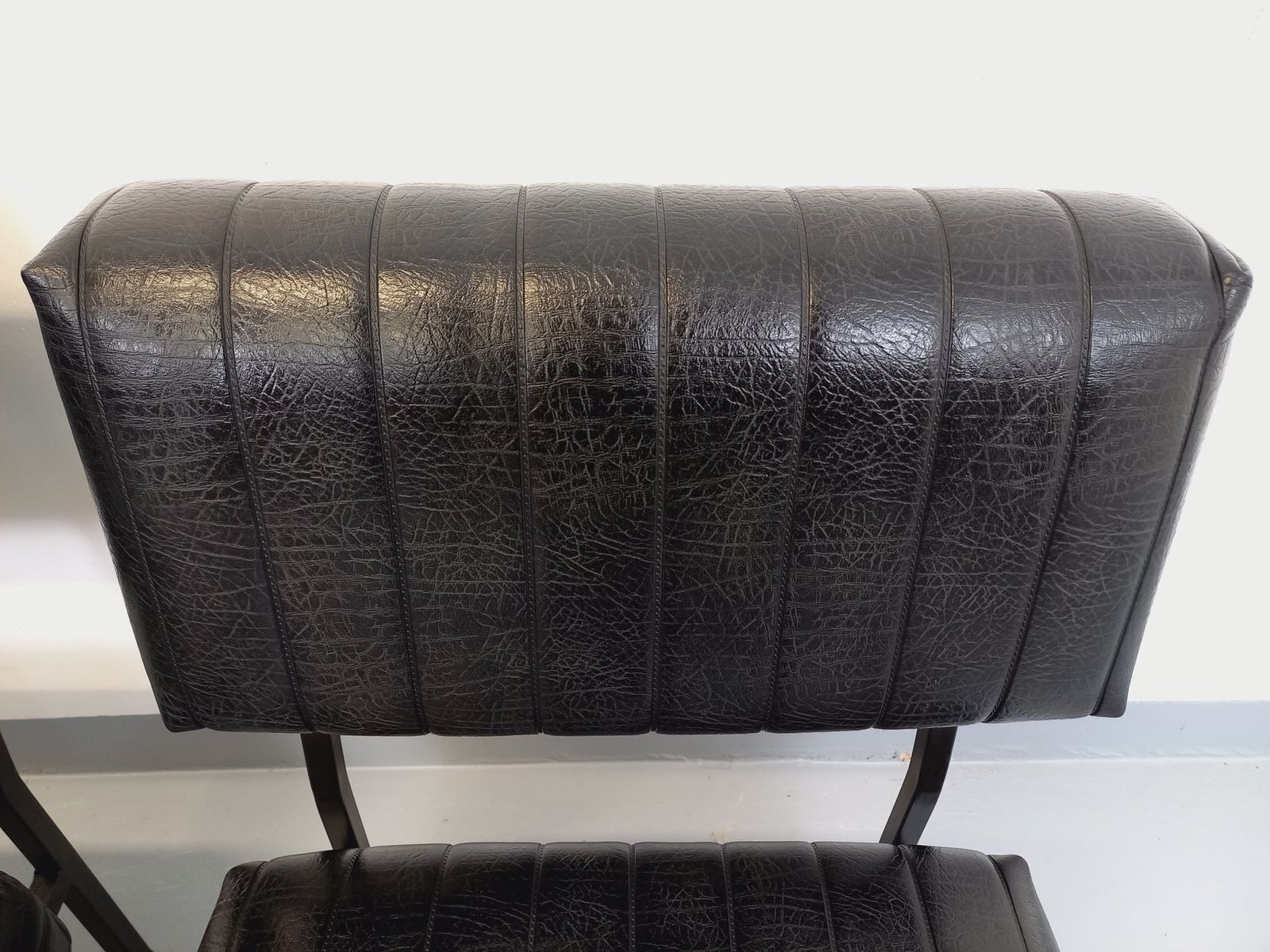 photo buy 2 Modernist Armchairs In Black Imitation Leather And Metal