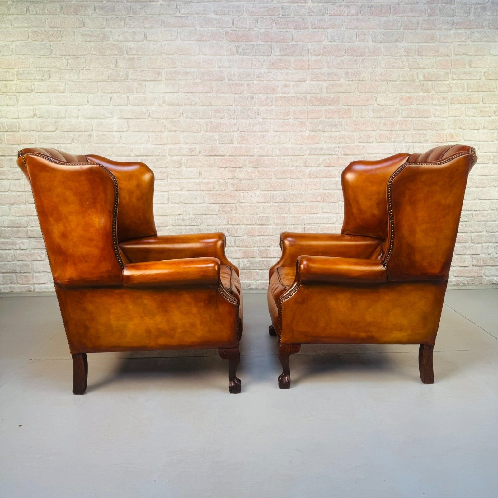 Vintage English Pair Of Hand Dyed Tan Leather Wingback Chairs photo buy