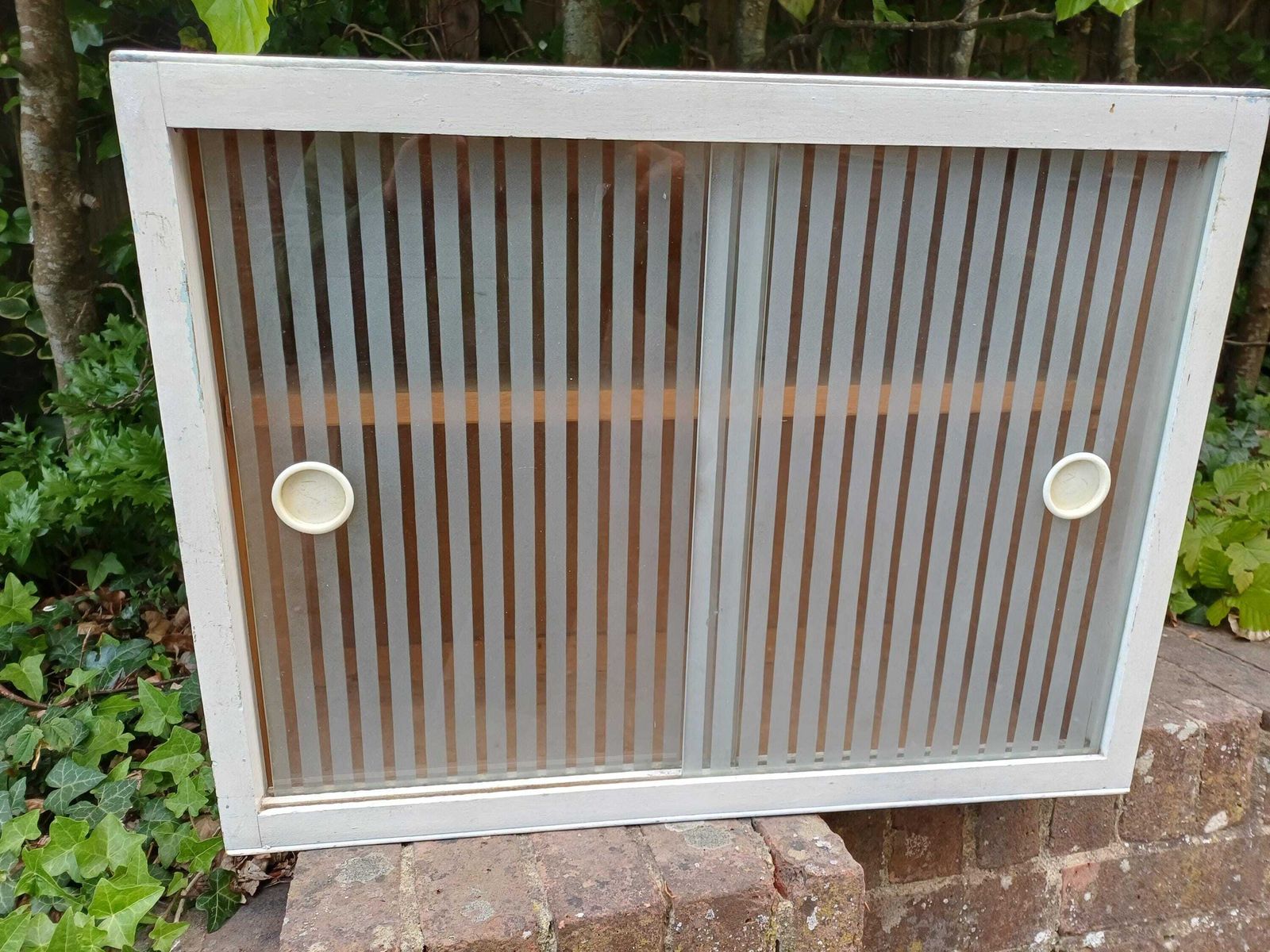 photo for sale 1950s Painted Kitchen Bathroom Wall Cupboard With Sliding Ribbed Glass Doors Mid Century Utility Storage Cabinet