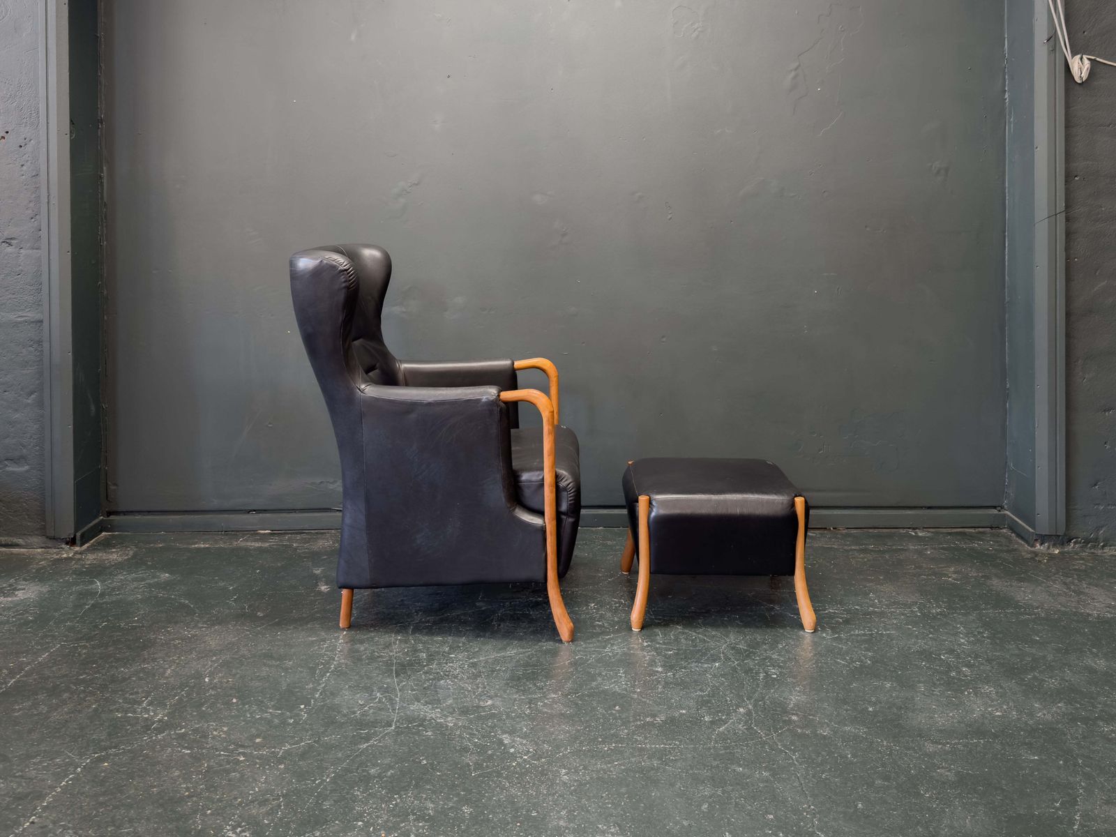 'Claudia' Black Leather And Beech Highback Armchair With Footstool By Stouby photo for sale