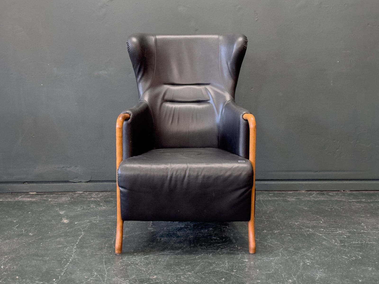 photo for sale 'Claudia' Black Leather And Beech Highback Armchair With Footstool By Stouby