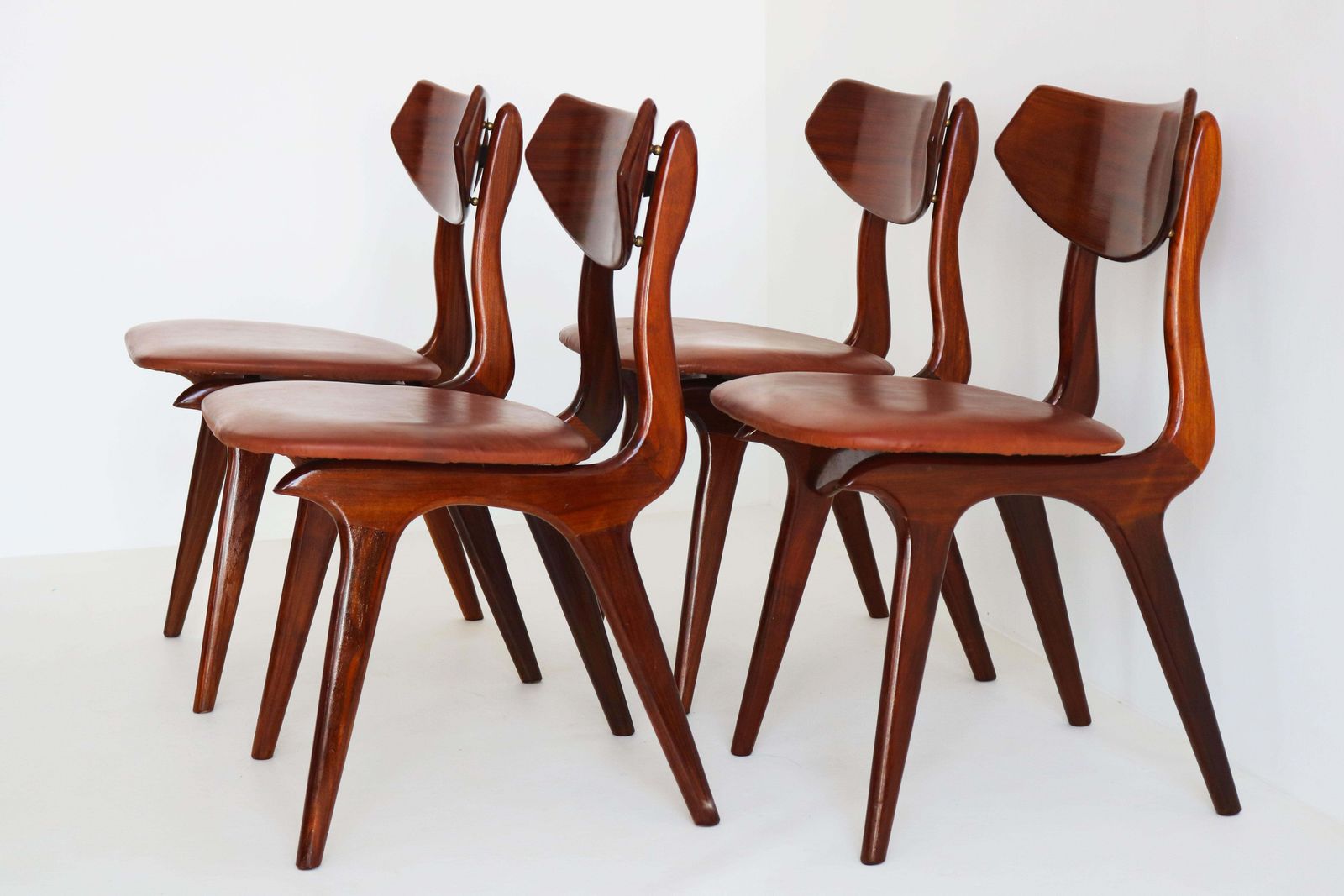 Lot de 4 chaises de salle à manger de design néerlandais par Louis van Teeffelen pour AWA, 1960, en teck photo for sale