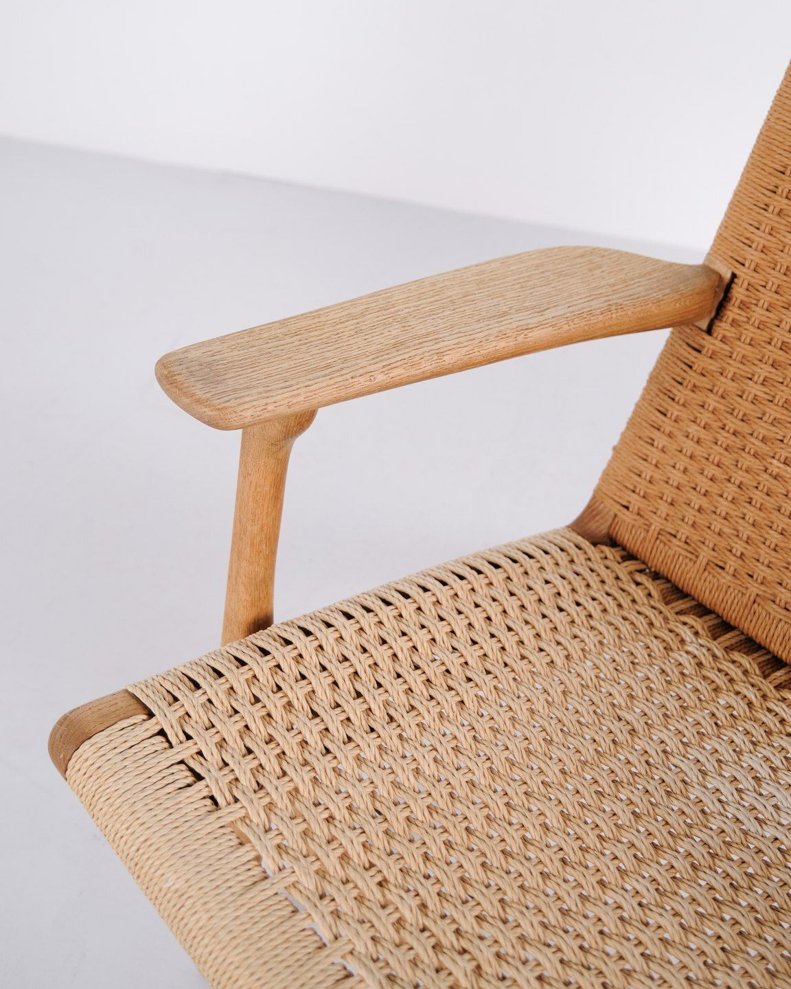 Ch25 Lounge Chair In Patinated Solid Oak And Woven Paper Cord By Hans J. Wegner photo Furniture