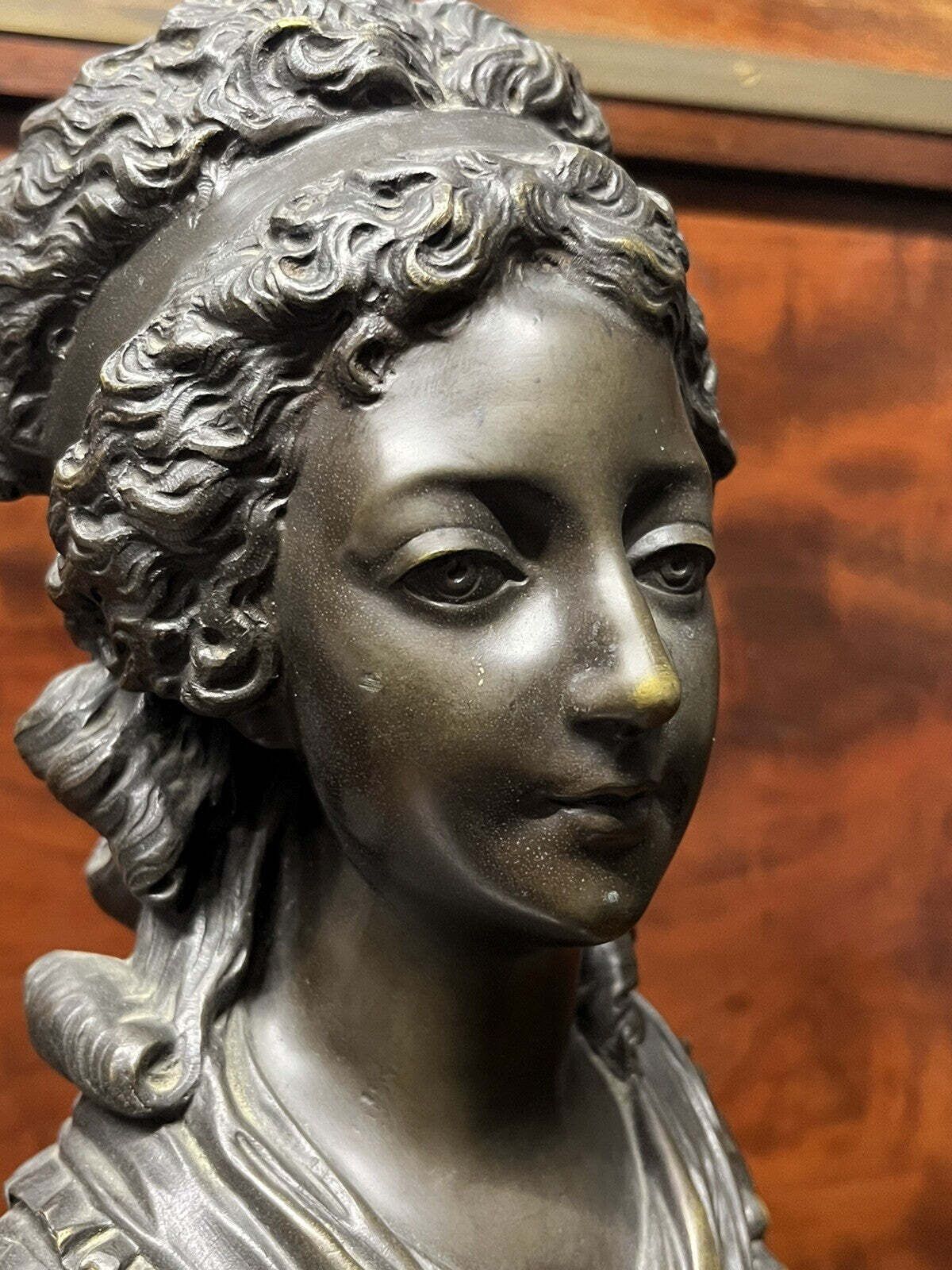 Bronze Bust Of A French Woman On A White Marble Column photo Art