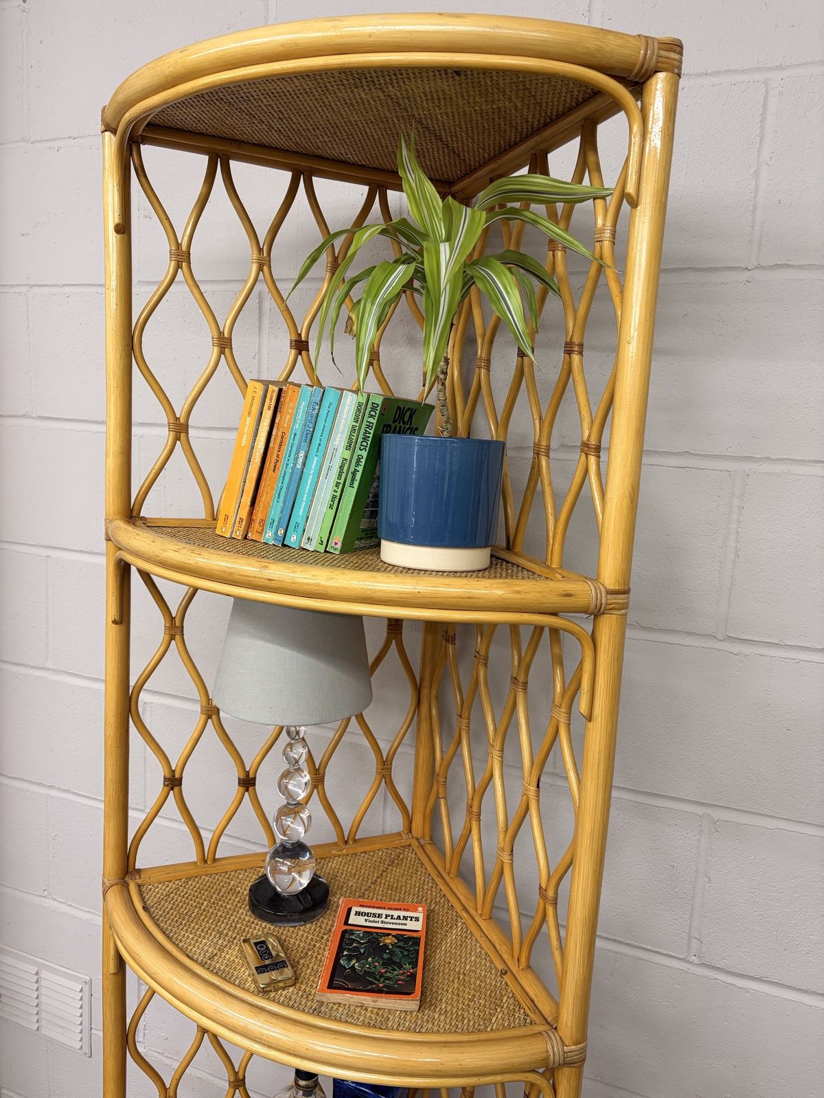 Furniture Vintage Tall Corner Cane/ Rattan Shelving Unit photo