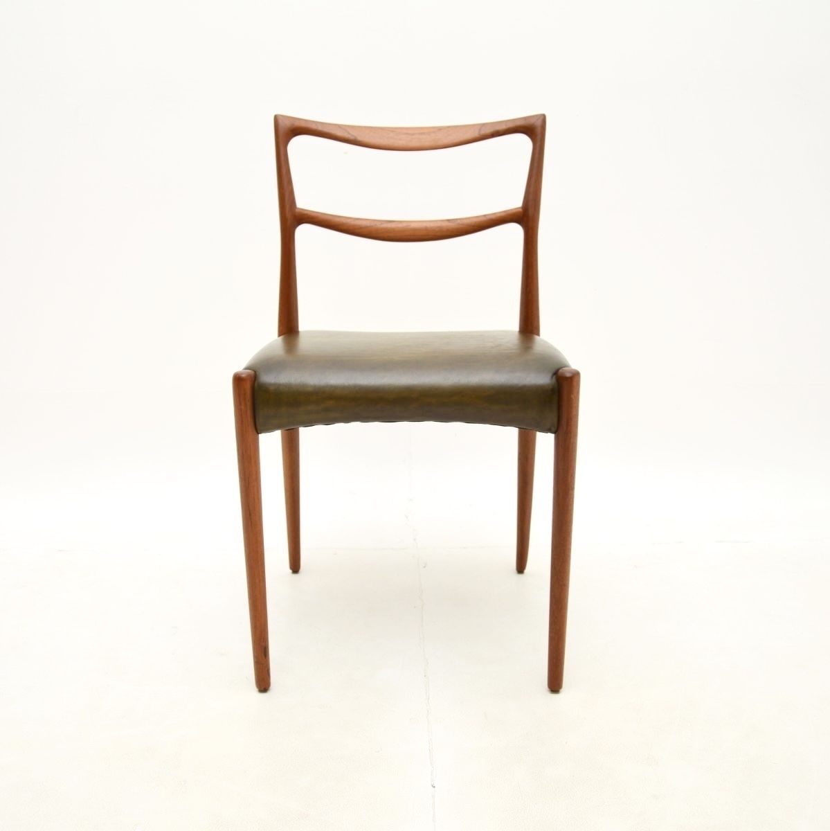 photo furniture Pair Of Danish Teak And Leather Chairs By Henry Klein For Bramin
