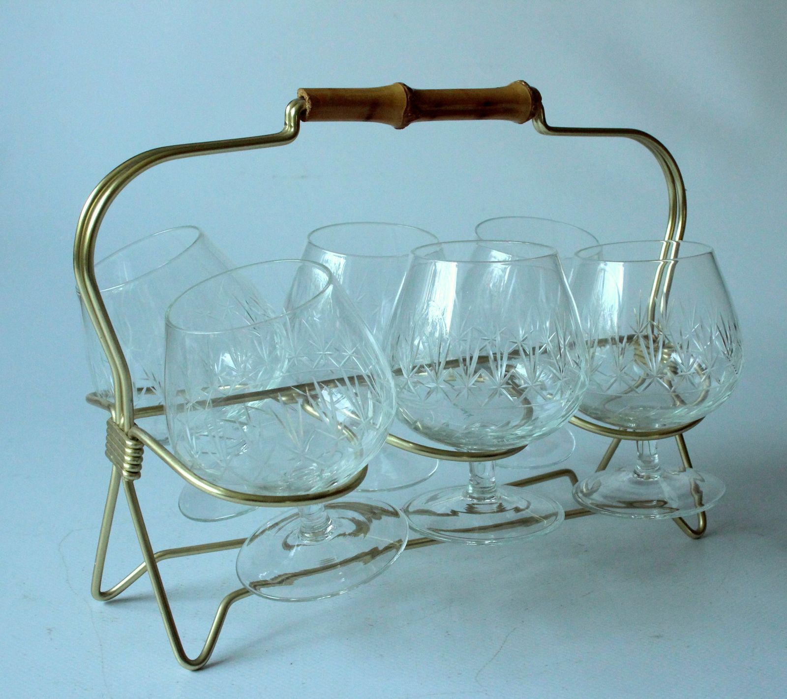 1950s   Rockabilly Old Cut Cognac Glasses In A Brass Stand With Wooden Handle   Set Of 6 Glasses And A Stand   Vintage photo for sale