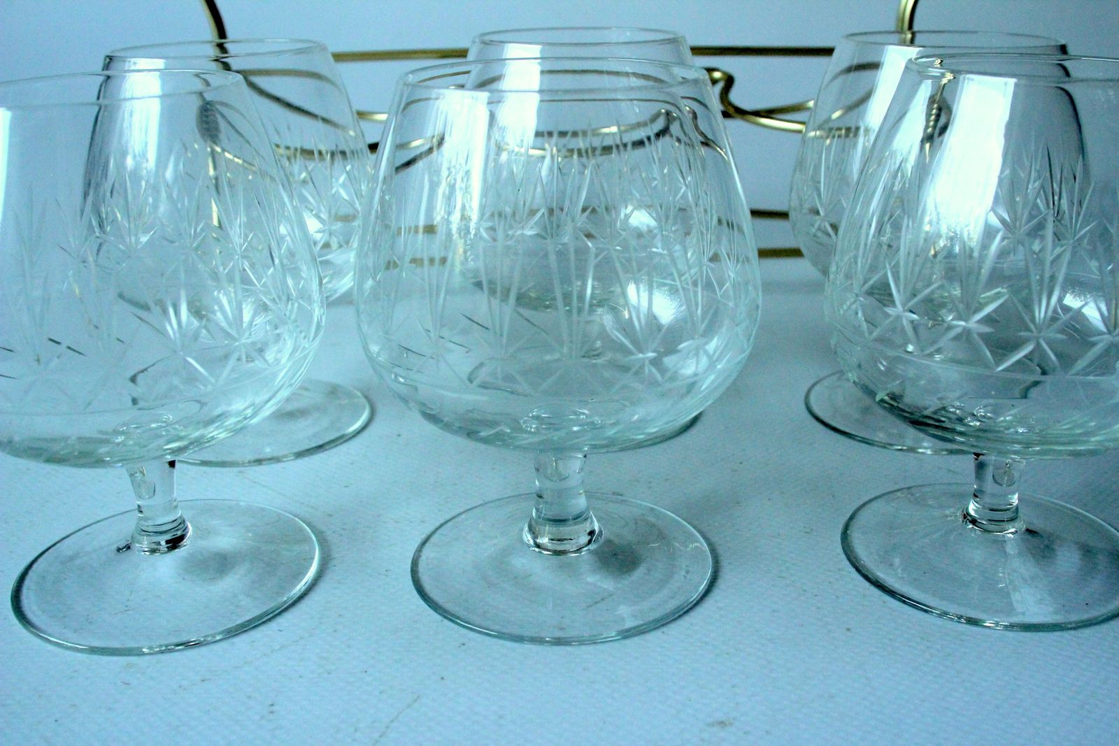 1950s   Rockabilly Old Cut Cognac Glasses In A Brass Stand With Wooden Handle   Set Of 6 Glasses And A Stand   Vintage photo vintage