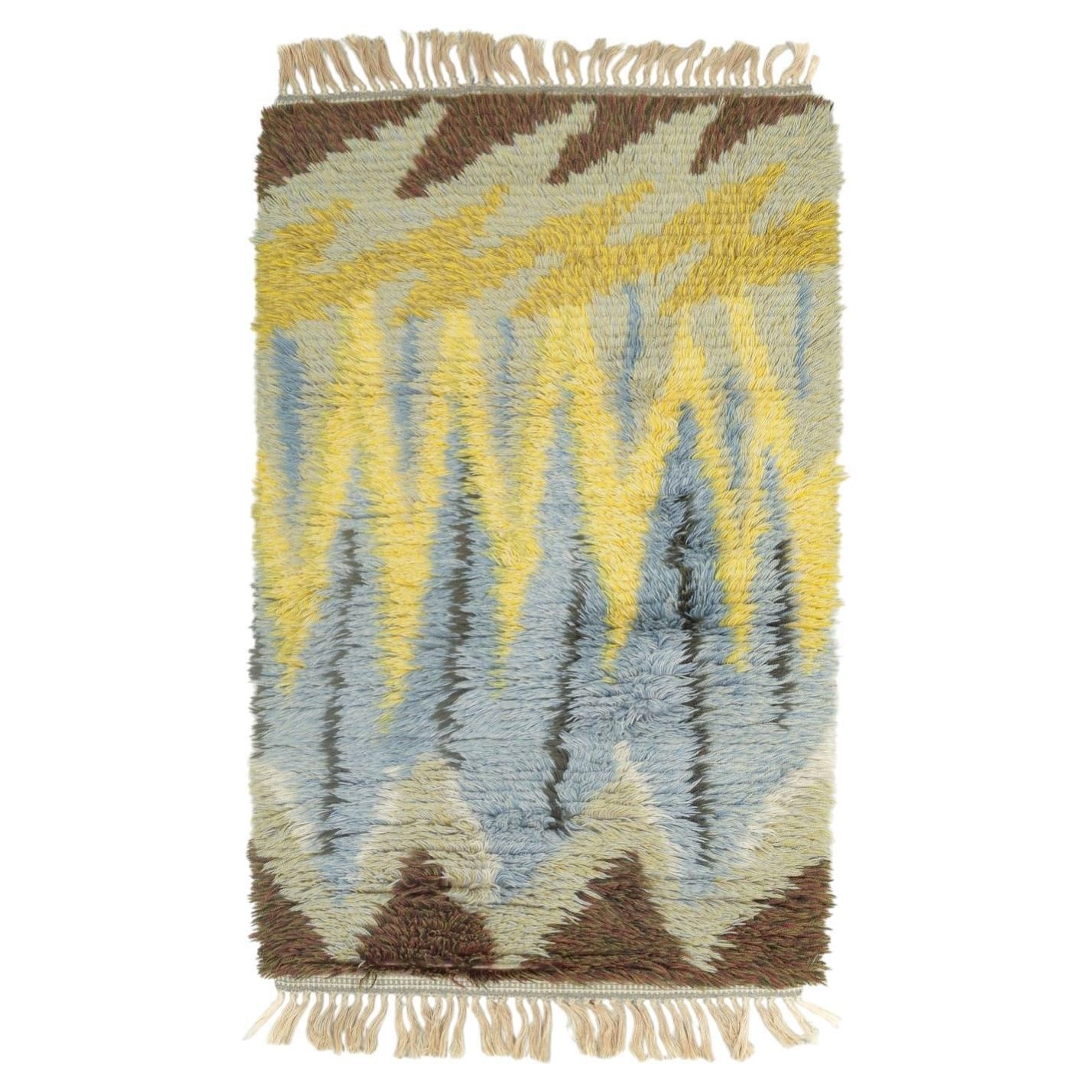 Scandinavisch ontwerp. Rya-tapijt in wol met zigzagpatroon.