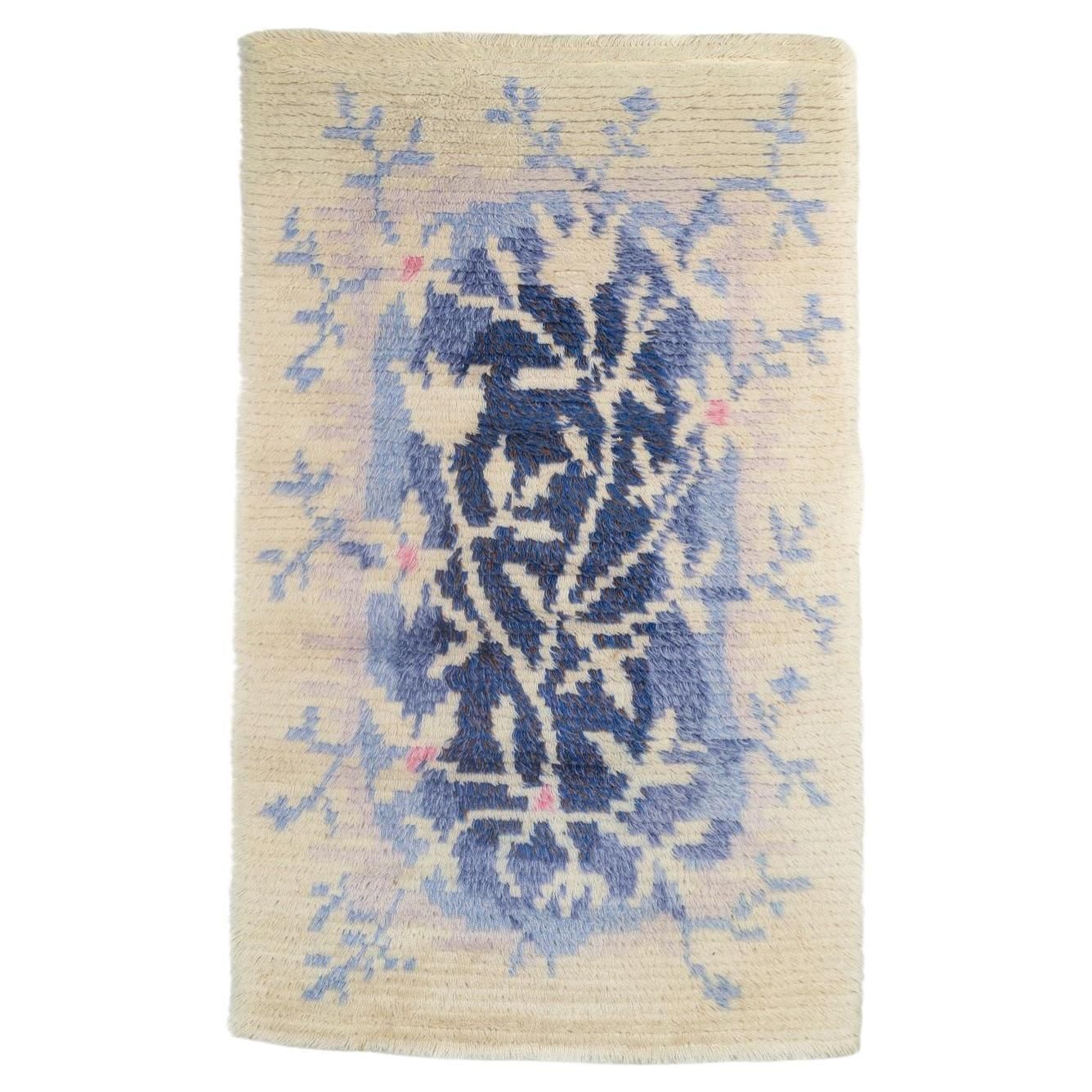 Scandinavisch ontwerper. Rya-tapijt in wol met bloemmotief. Jaren 1960/70