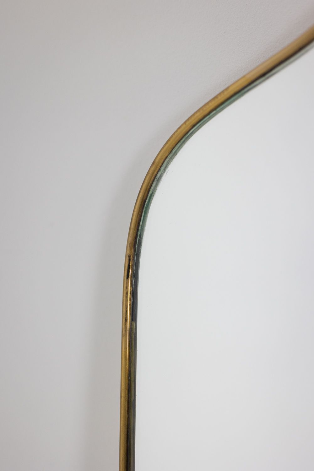 Pair Of “Chapeau De Gendarme” Shaped Mirrors. 1970s. photo for sale