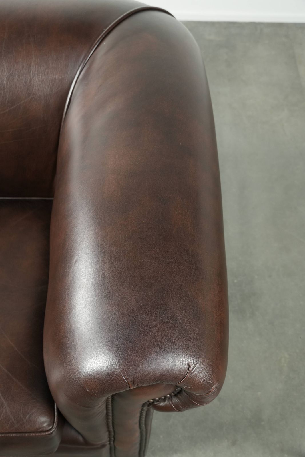 Luxurious Brown Cowhide Chesterfield Armchair With A Timeless English Look. photo vintage
