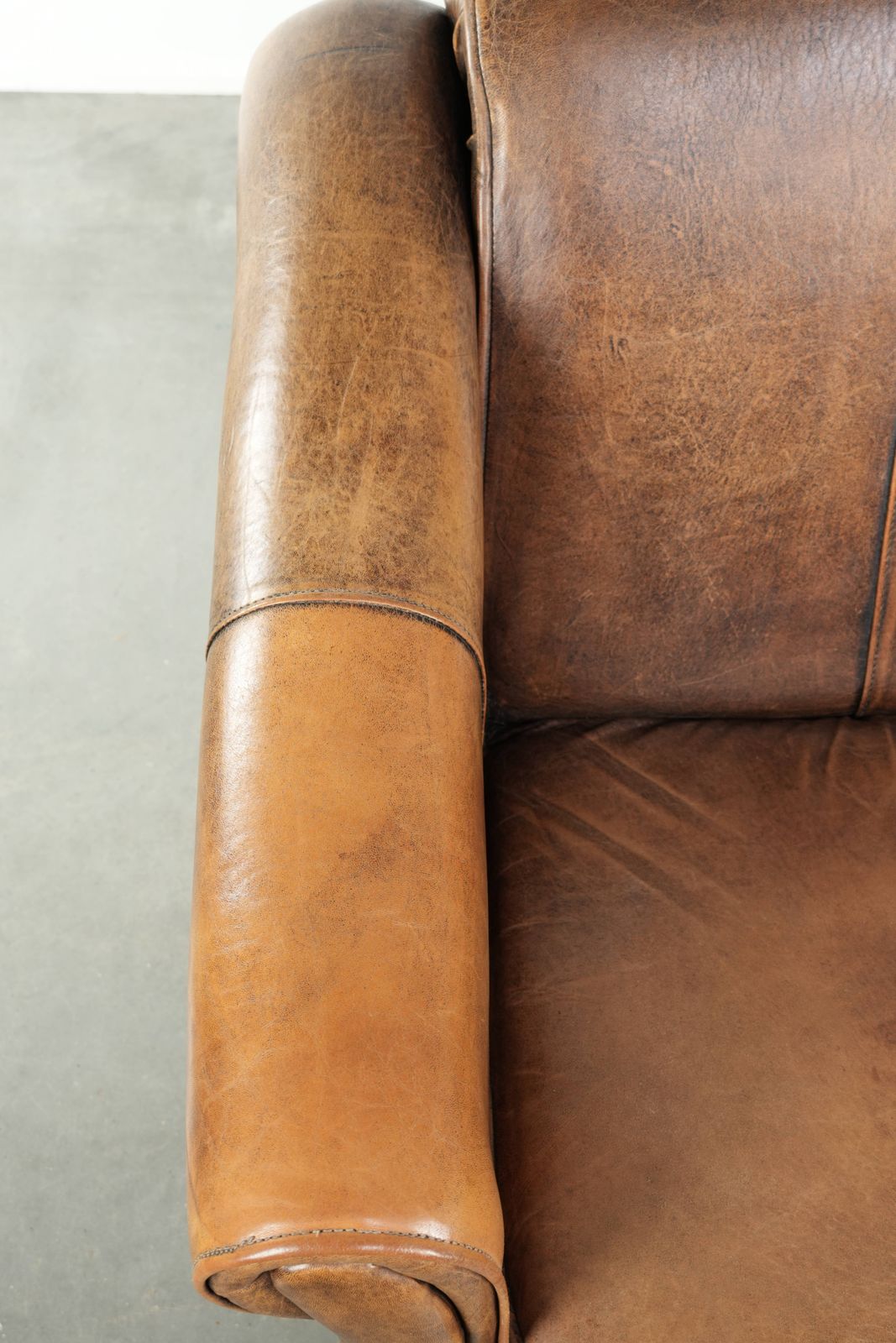Beautifully Designed And Comfortable Sheepskin Armchair With A Timeless Look And A Finish With Matching Piping. photo buy