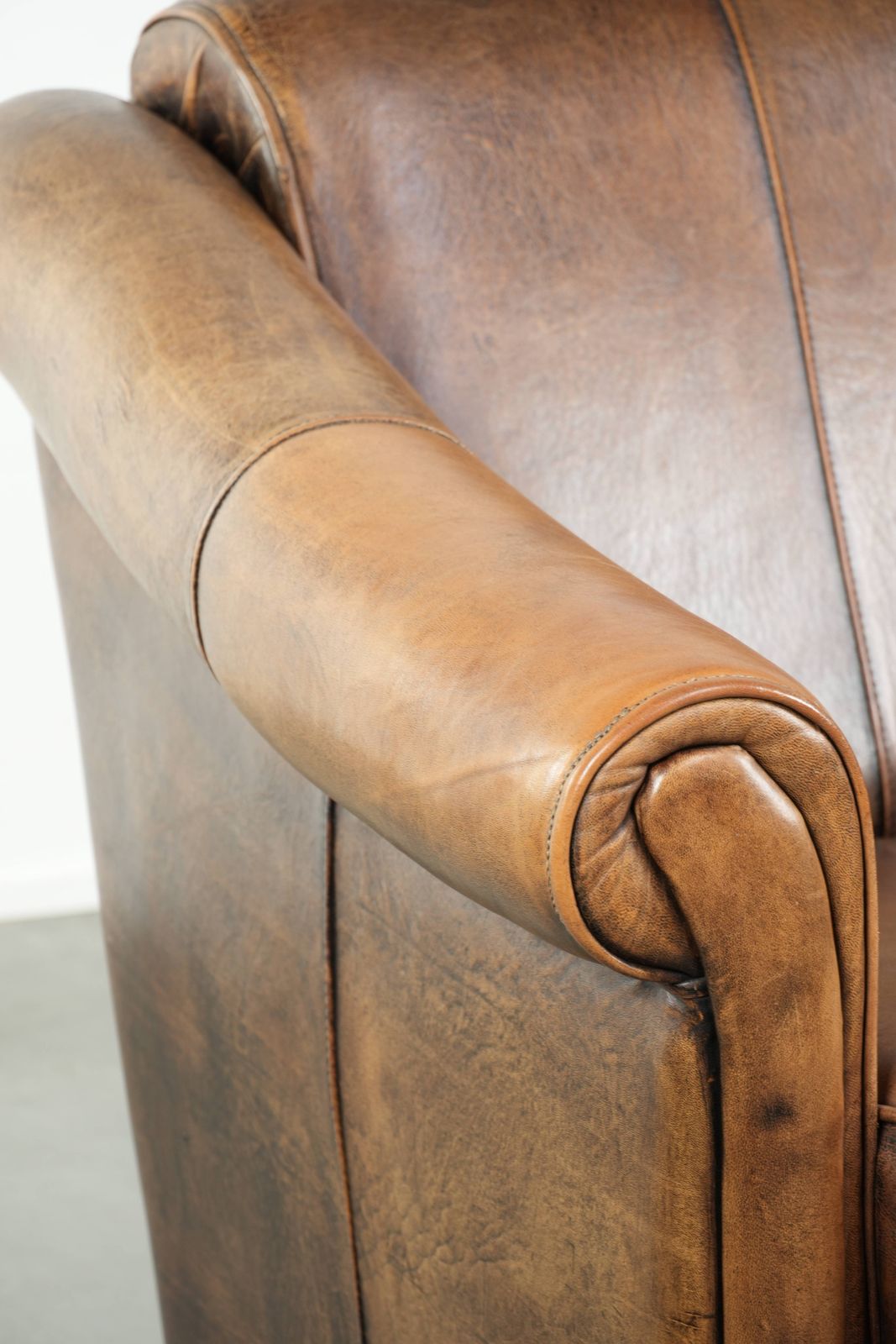 Furniture Beautifully Designed And Comfortable Sheepskin Armchair With A Timeless Look And A Finish With Matching Piping. photo