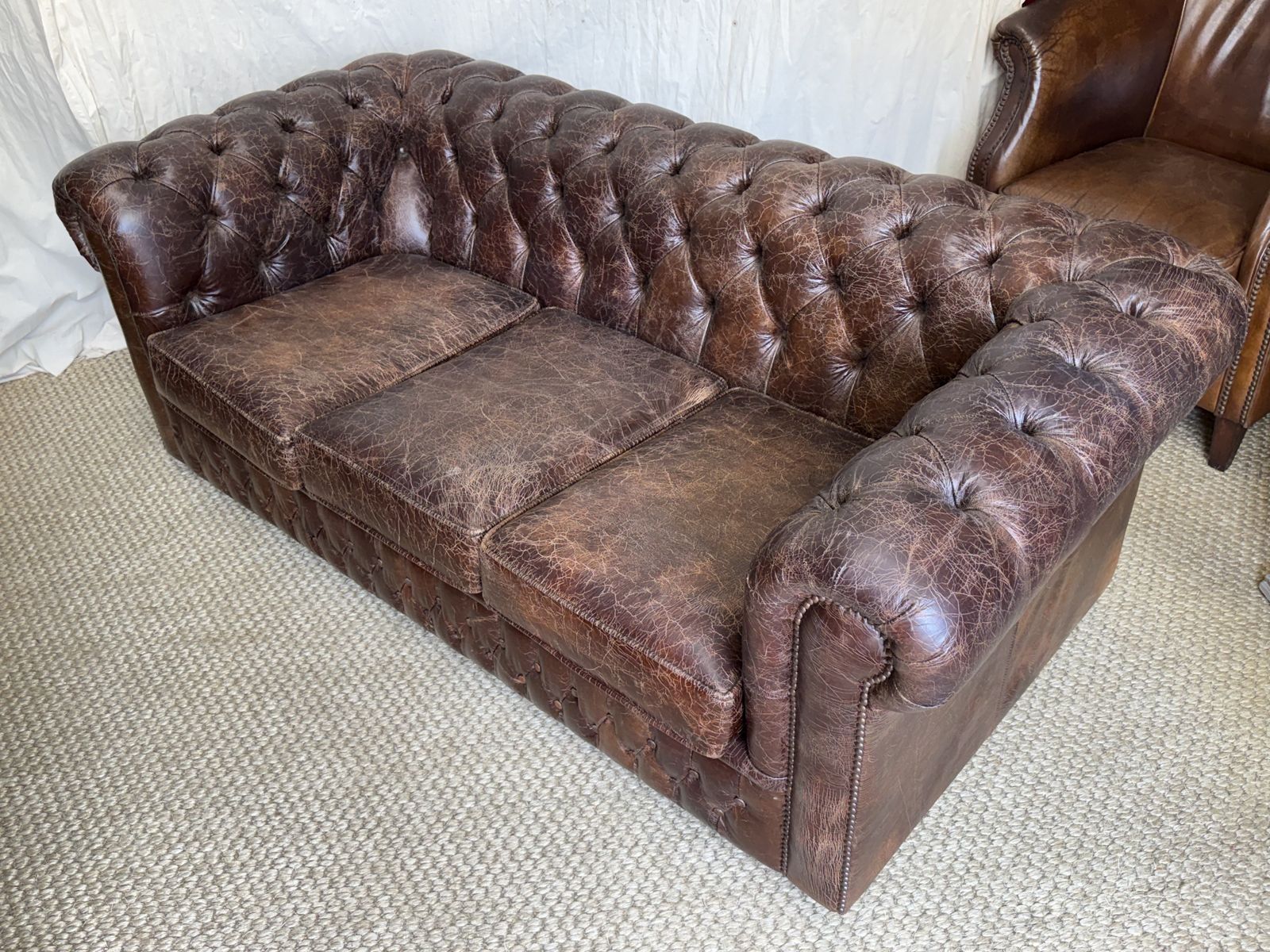 photo furniture Cracked Faux Leather Upholstered 3 Seater Chesterfield Sofa