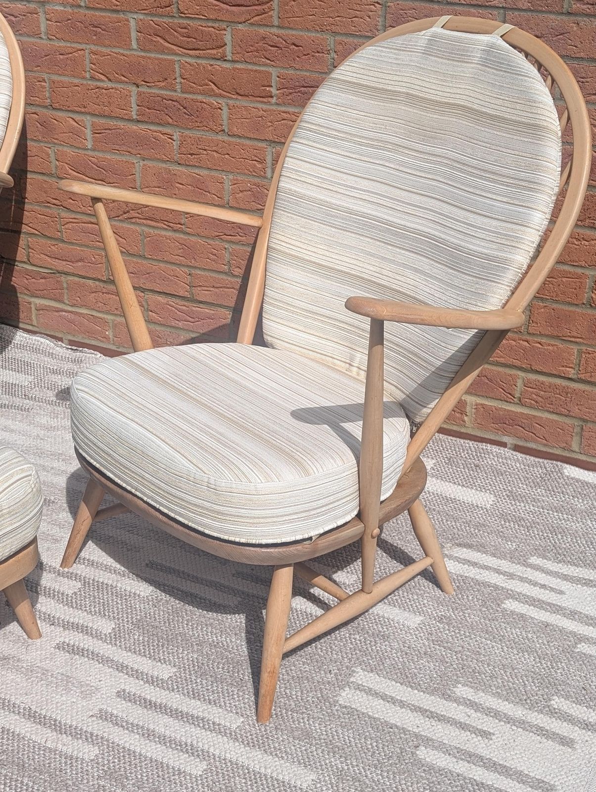 Pair Of Ercol 317 Grandfather Armchairs In Blonde Finish With Matching Footstool Including Original Cushions And Covers By Lucian Ercolani. photo for sale