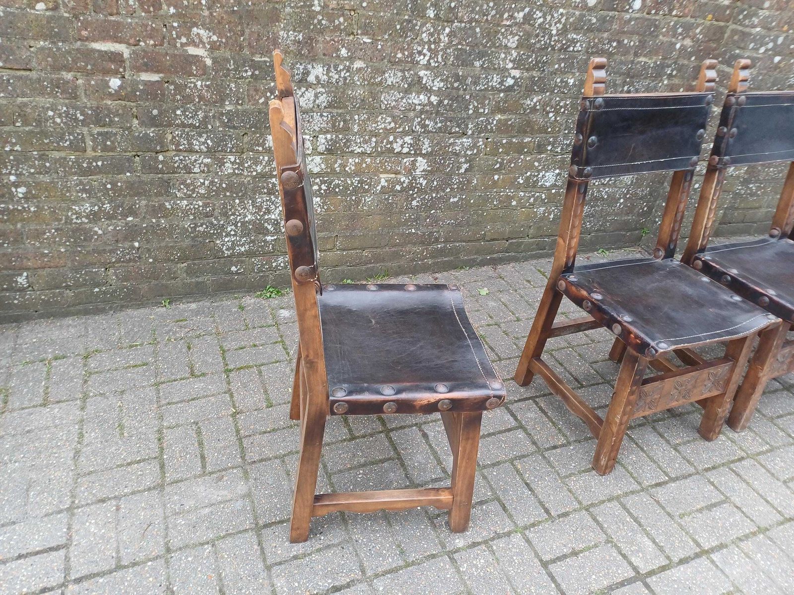 photo vinterior Set Of 4 Vintage Spanish Style Oak And Leather Dining Chairs Carved Wood Studded Seats Rustic 1980s Kitchen Dining Chairs