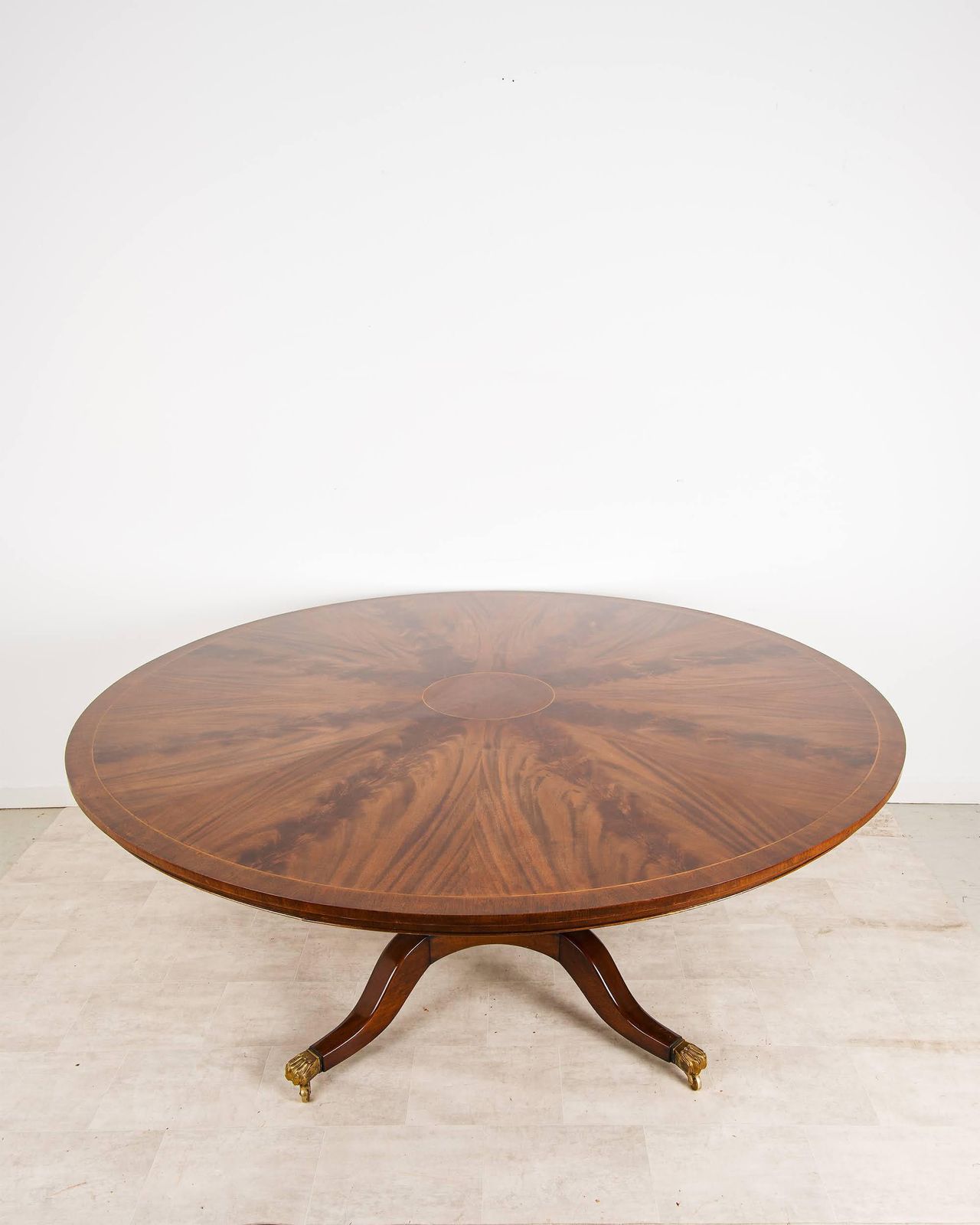 Large Regency Style Flame Mahogany Circular Dining Table With Brass Lion Paw Castors photo 1850.0
