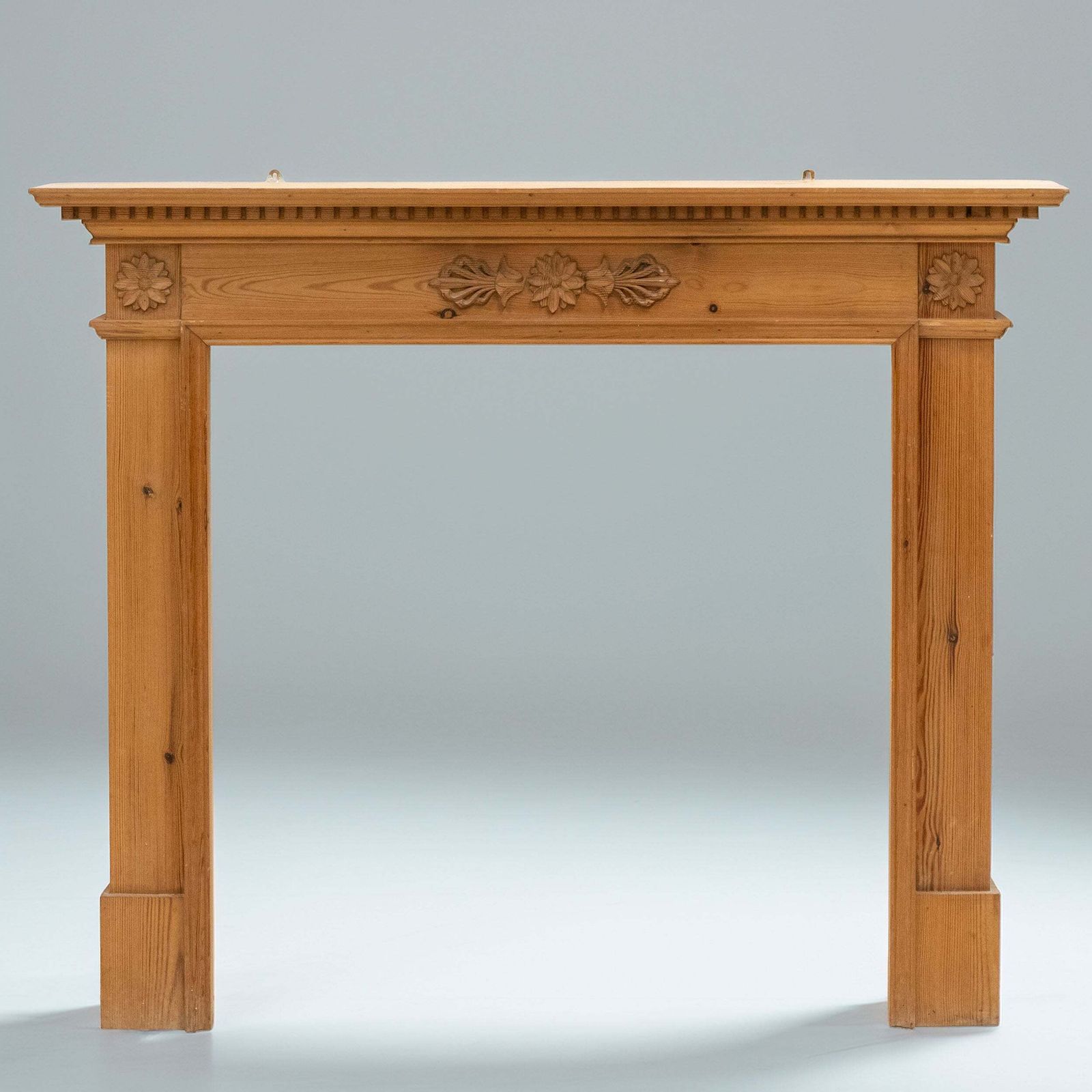 Antique Wooden Fireplace Surround With Flowers