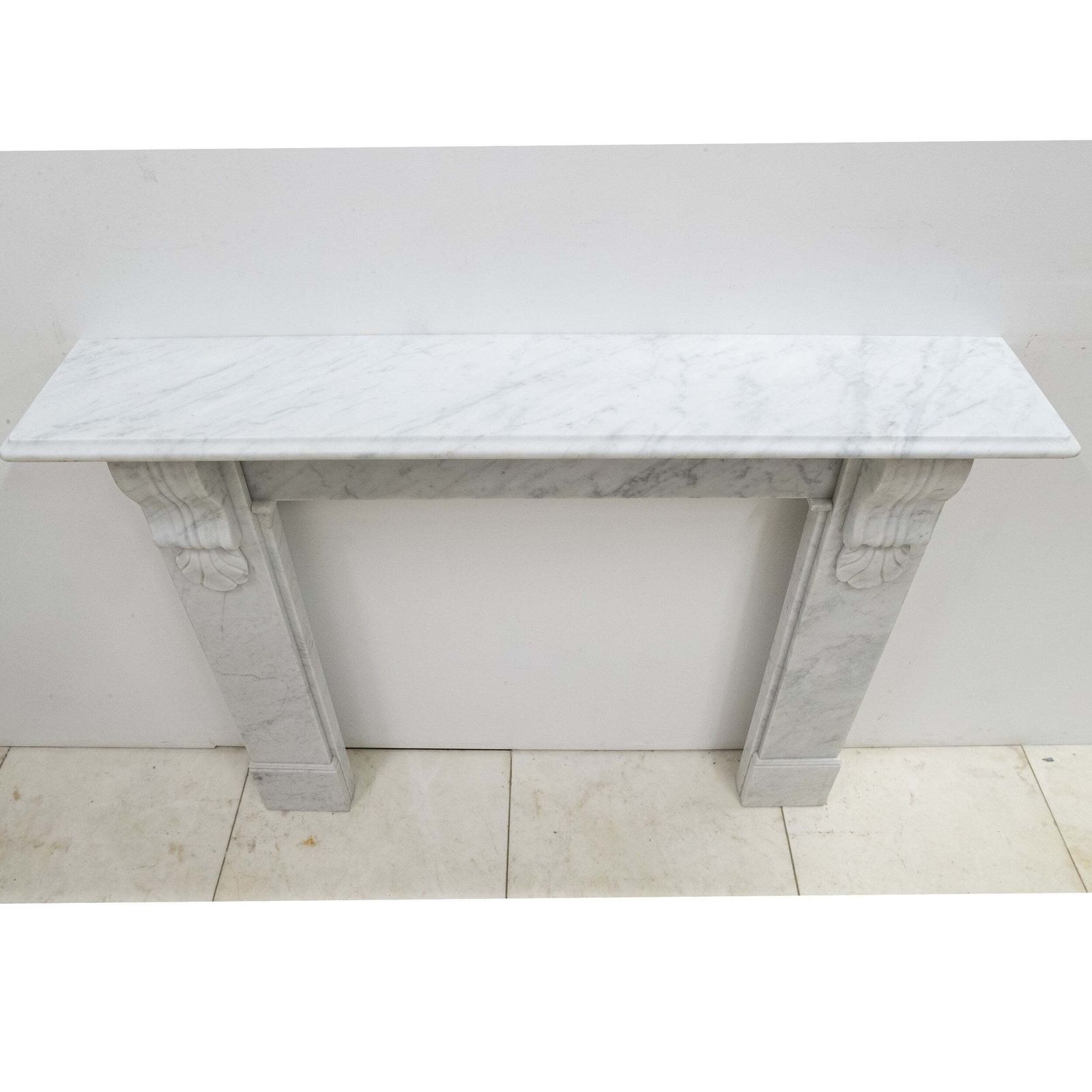 1650.0 Victorian Style Carrara Marble Fireplace Surround With Corbels photo